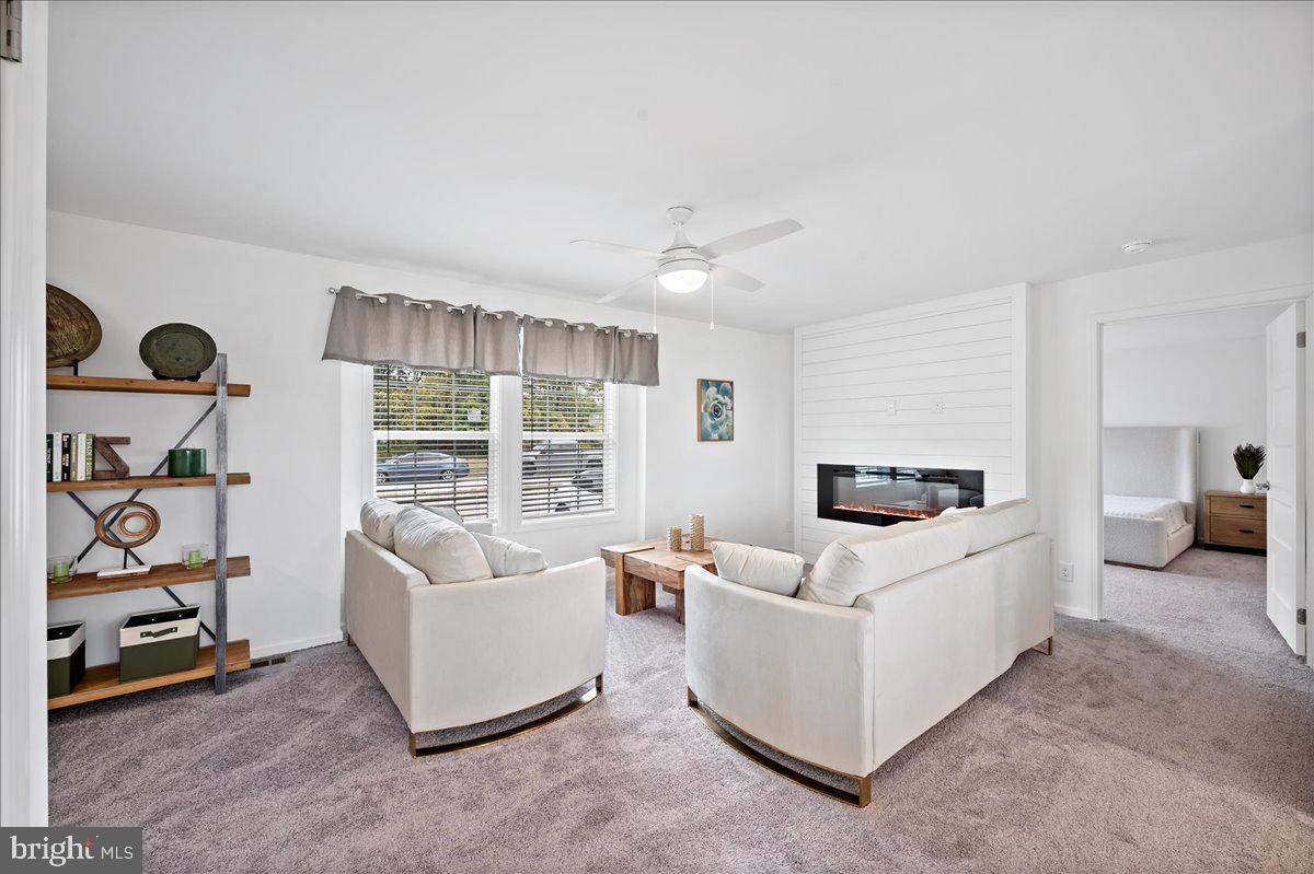 3983 Hastings Road Walnutport, PA 18088 - Photo 8 of 51 a living room with furniture and a flat screen tv
