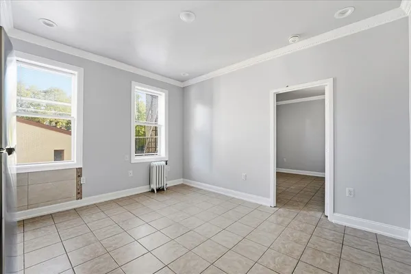 a view of an empty room with window