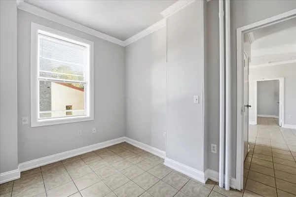 an empty room that has a window