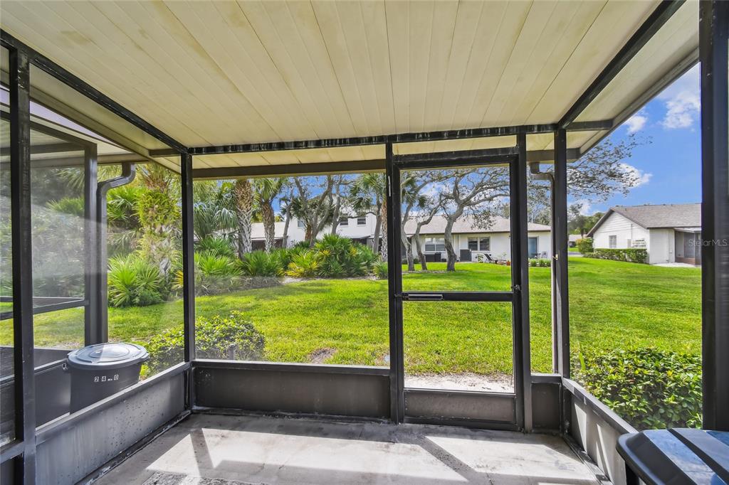 2480 Enterprise Road, Unit 6 Clearwater, FL 33763 - Photo 21 of 43 a view of porch with a garden
