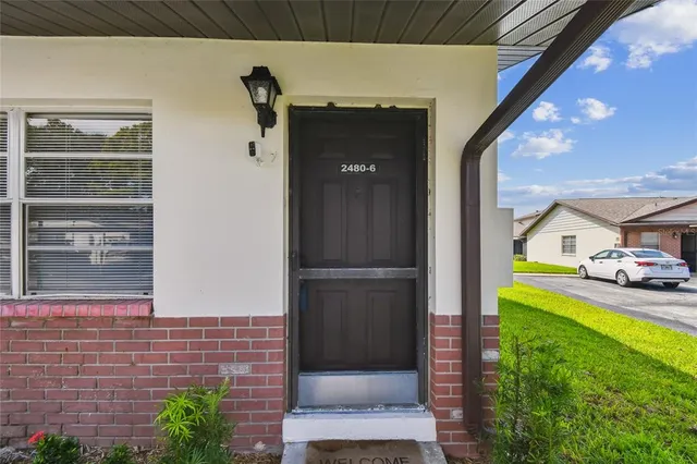 a view of swimming pool with seating space