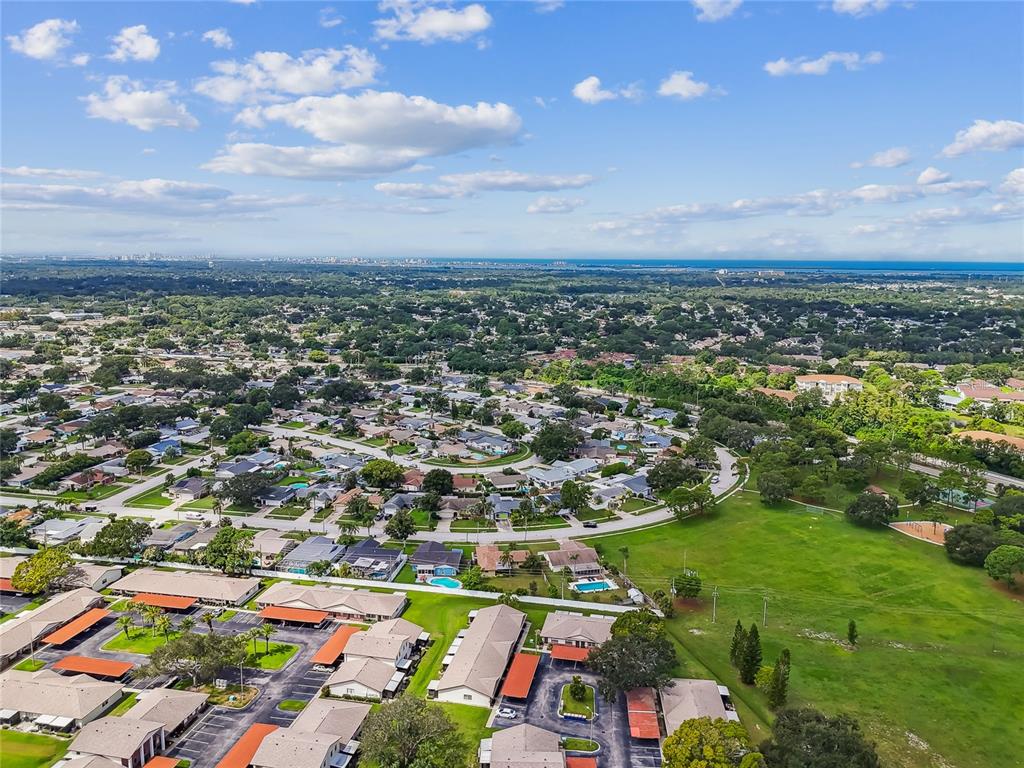 2480 Enterprise Road, Unit 6 Clearwater, FL 33763 - Photo 33 of 43 an aerial view of multiple house