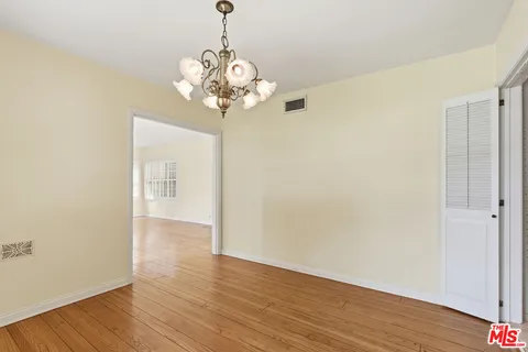 a view of a chandelier in a room