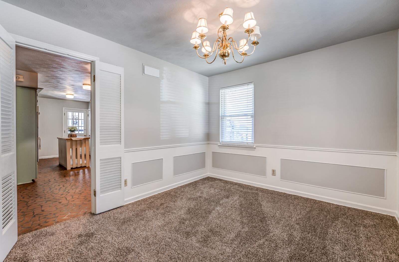 1675 Hayne Road Memphis, TN 38119 - Photo 6 of 25 a view of an empty room with a window