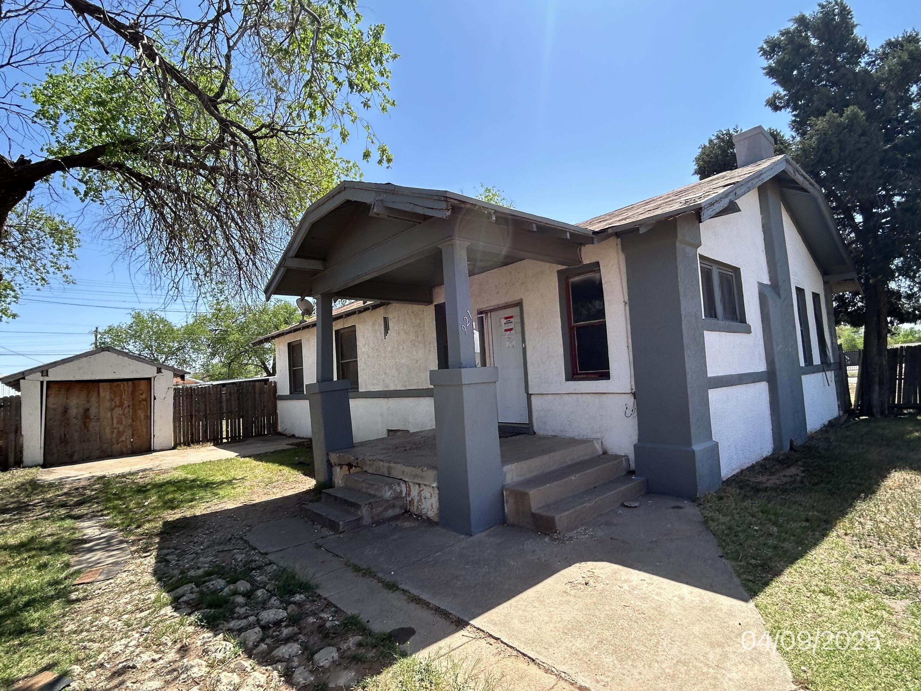 1921 Dixie Drive Lubbock, TX 79411 - Photo 1 of 19 a view of a house with backyard and sitting area