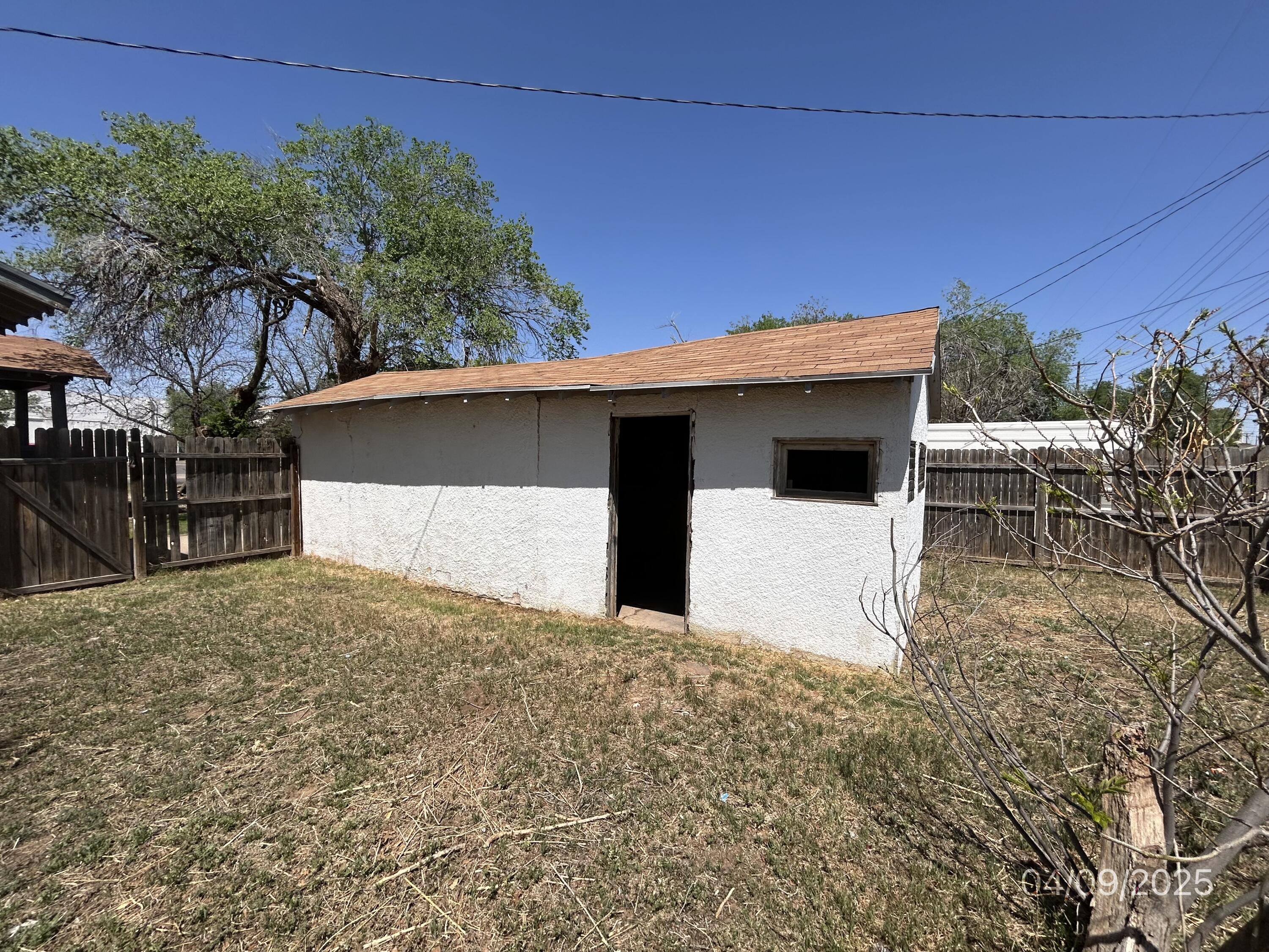 1921 Dixie Drive Lubbock, TX 79411 - Photo 15 of 19 a view of a backyard