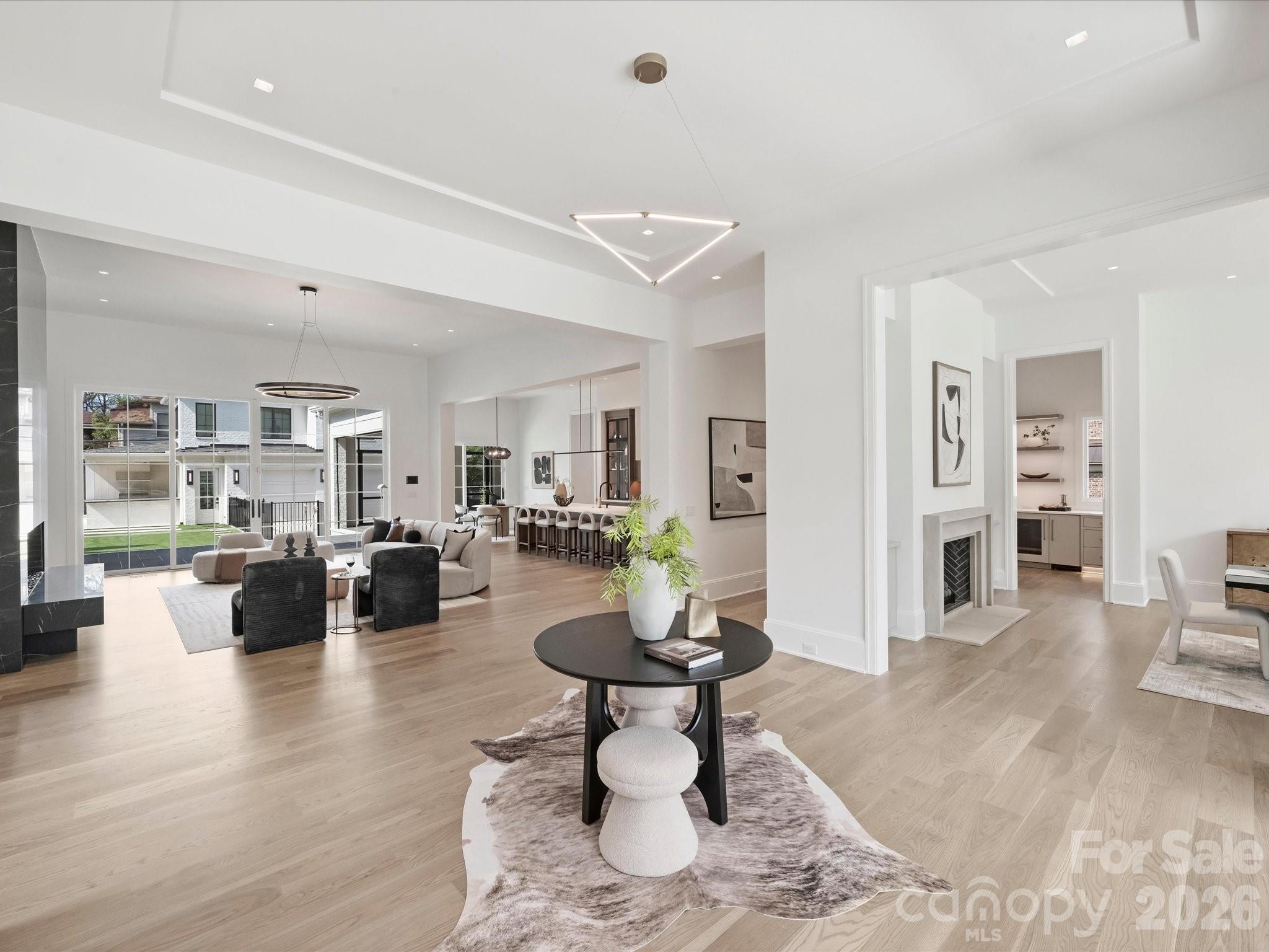 1436 Queens Road West Charlotte, NC 28207 - Photo 12 of 47 a living room with furniture and a wooden floor