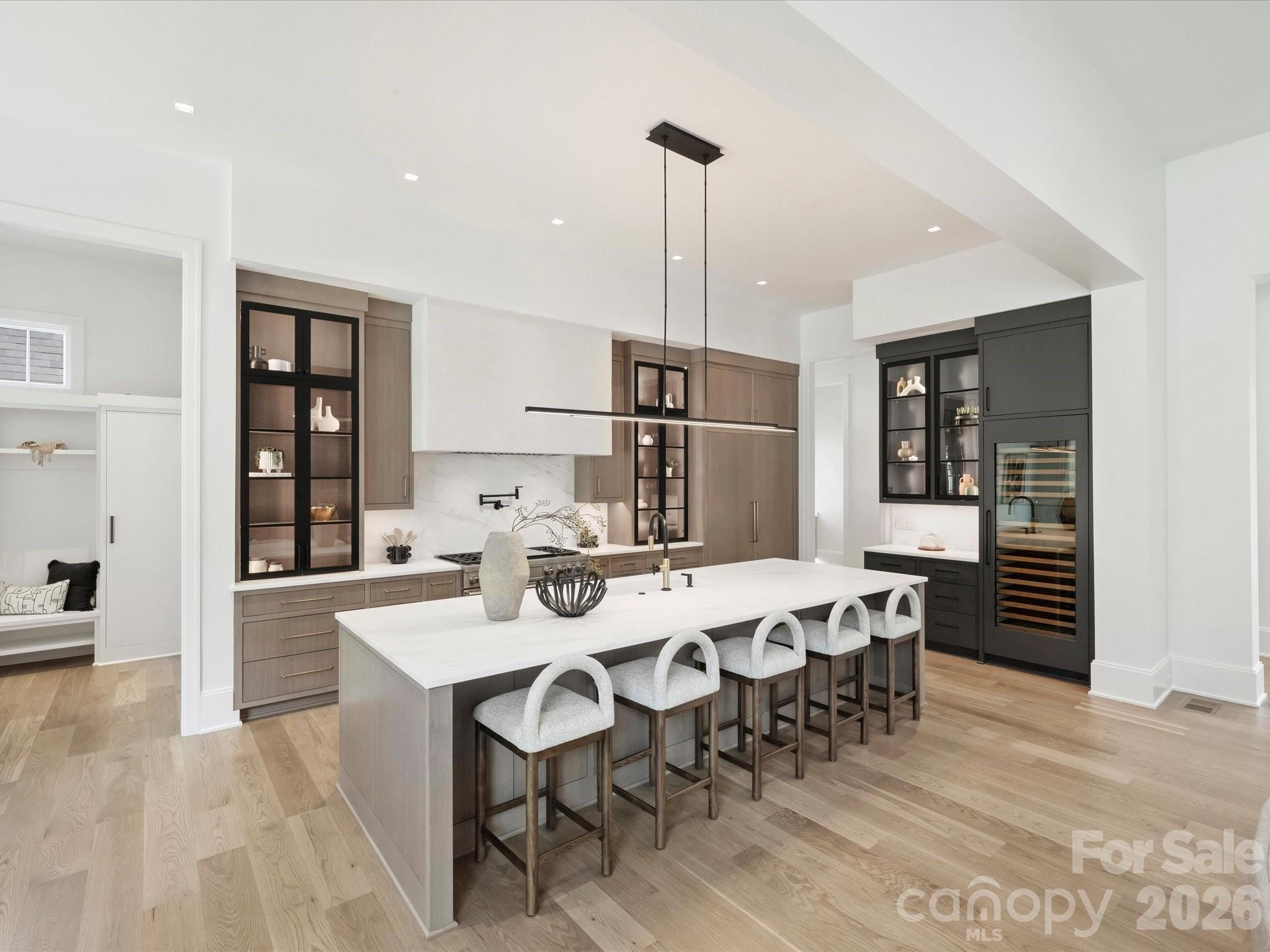 1436 Queens Road West Charlotte, NC 28207 - Photo 19 of 47 a large kitchen with a table and chairs