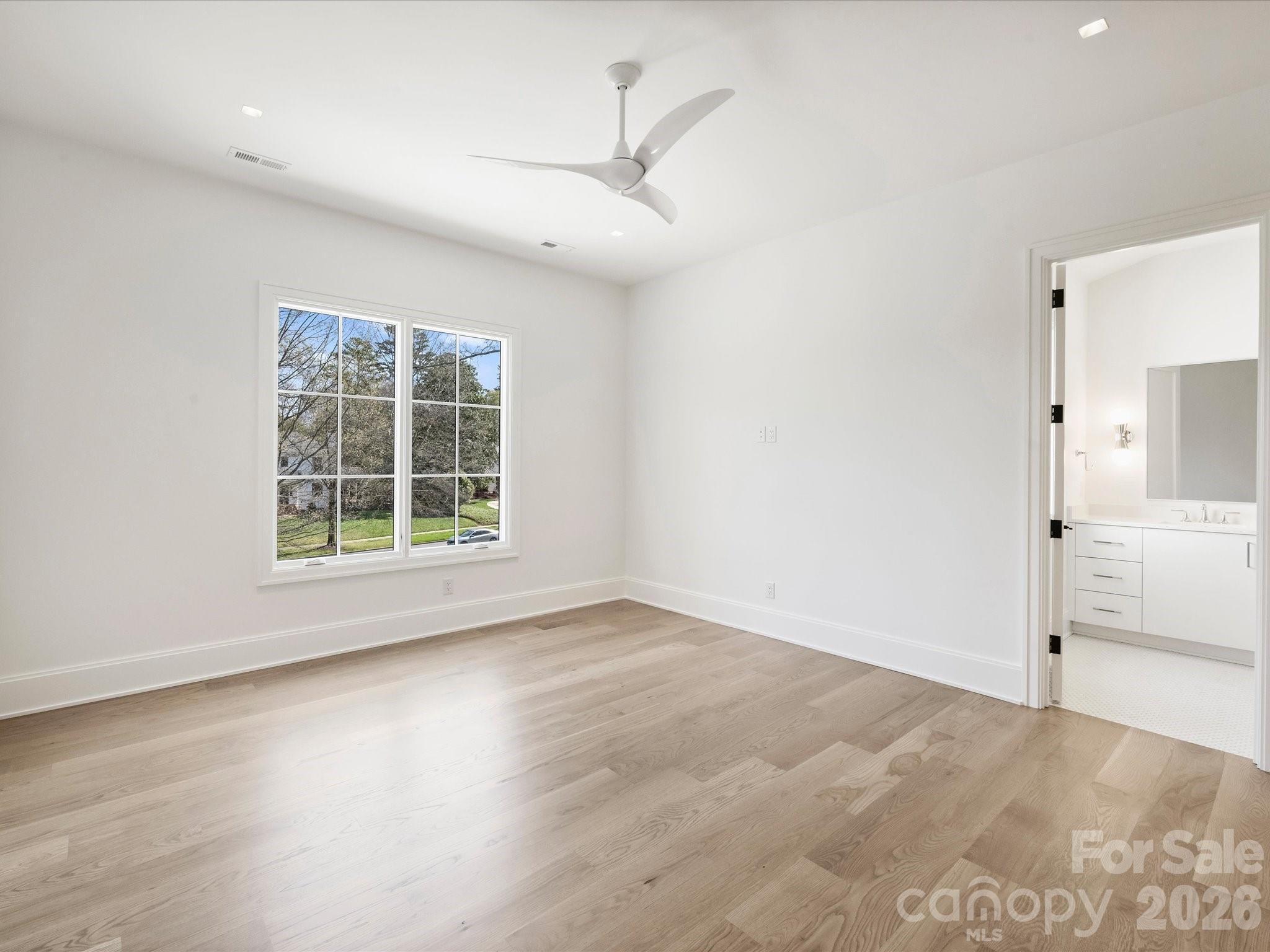 1436 Queens Road West Charlotte, NC 28207 - Photo 30 of 47 an empty room with windows and entrance
