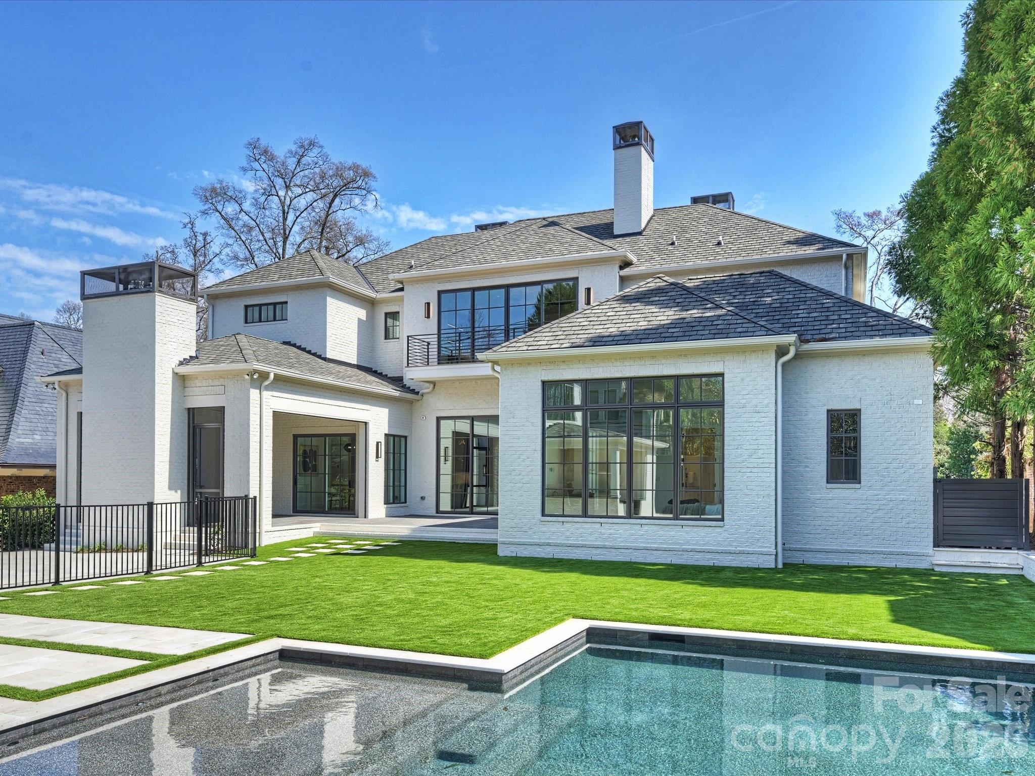 1436 Queens Road West Charlotte, NC 28207 - Photo 44 of 47 a view of a house with a swimming pool