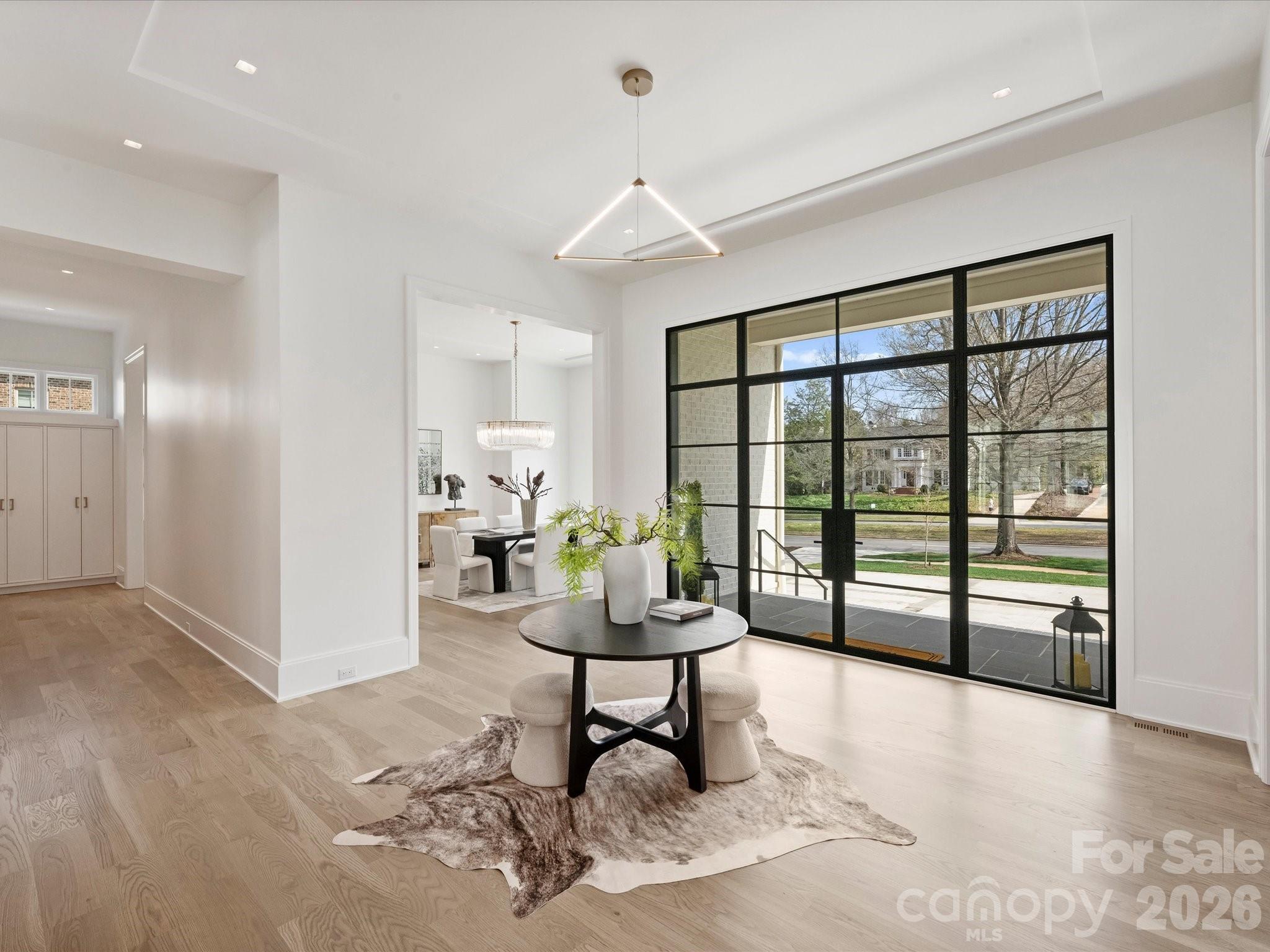 1436 Queens Road West Charlotte, NC 28207 - Photo 8 of 47 a living room with furniture and floor to ceiling window