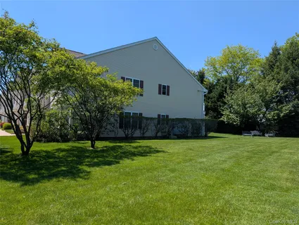 a house view with a garden space