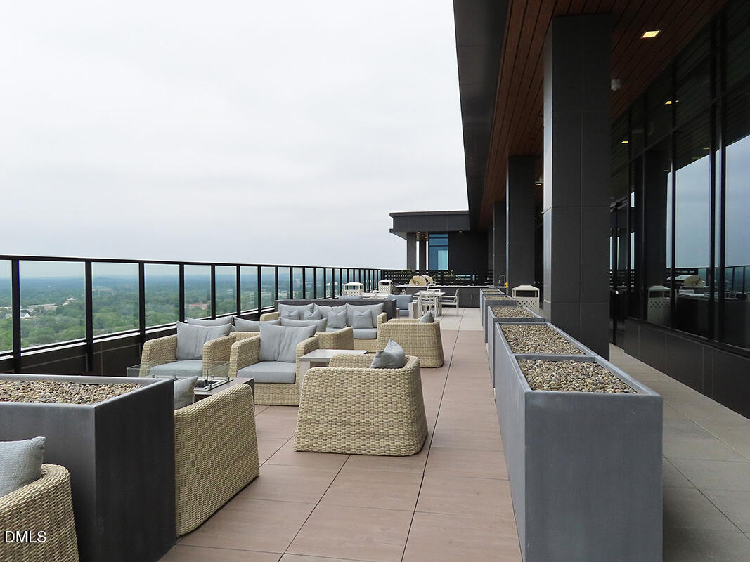 115 Morris Street, Unit 1908 Durham, NC 27701 - Photo 24 of 26 a terrace with couches and outdoor view