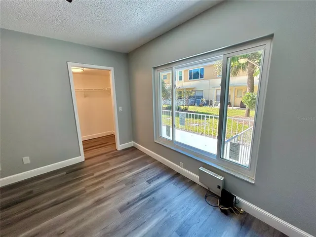 a bathroom with a sink toilet and mirror