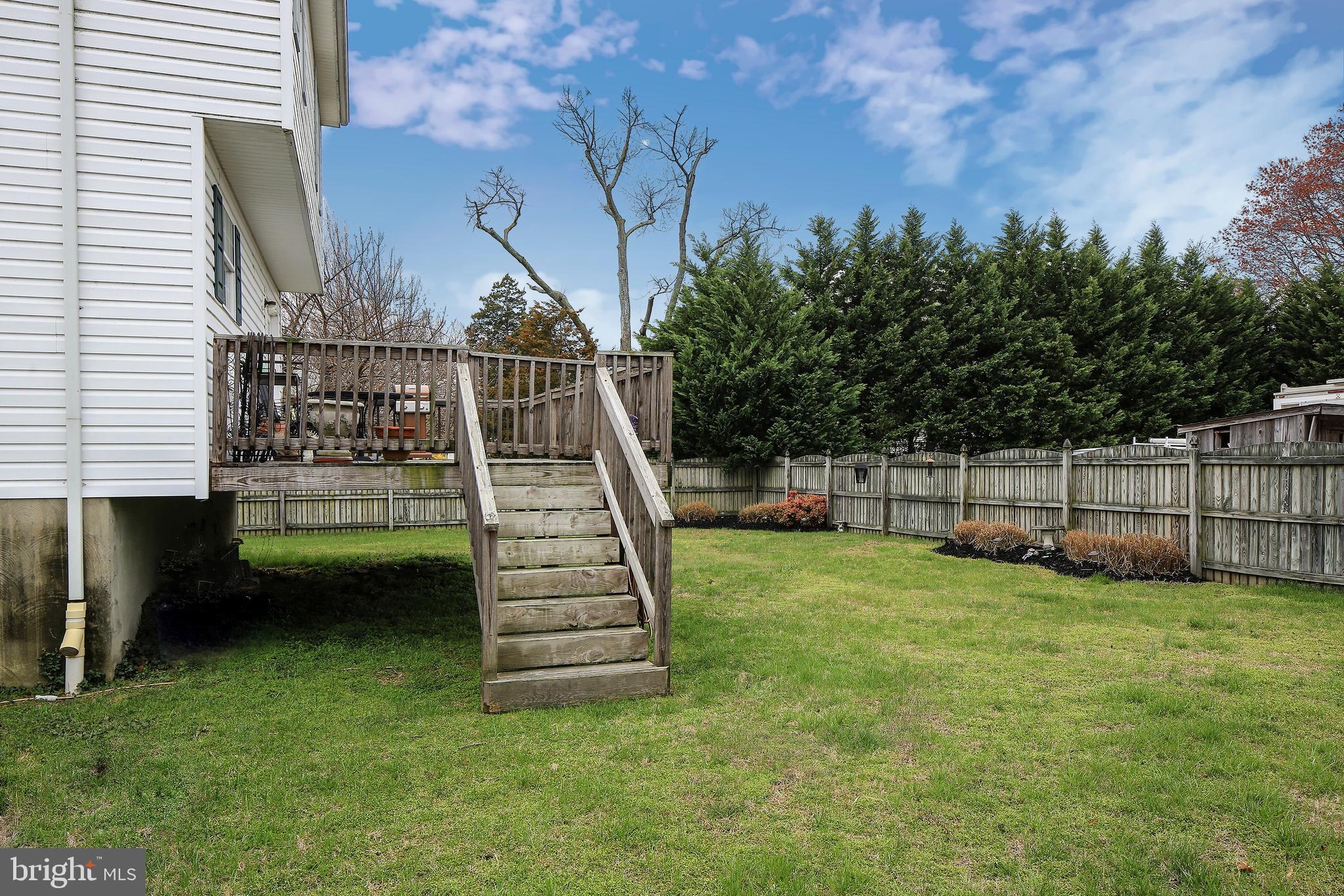8 Somerset Road Pasadena, MD 21122 - Photo 31 of 36 Stairs to the rear fenced yard
