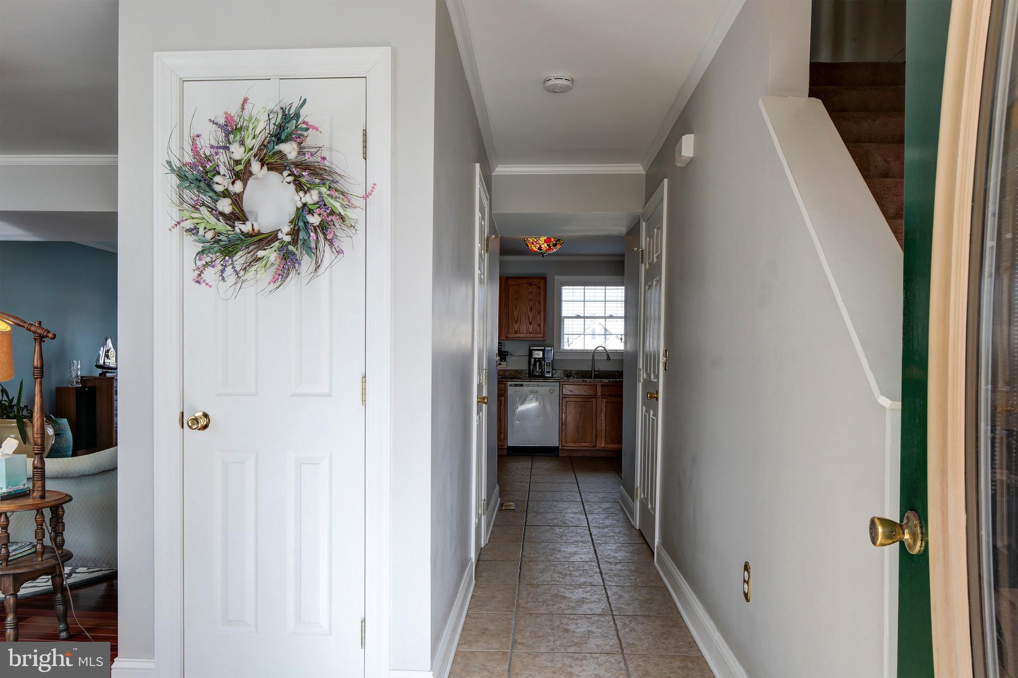8 Somerset Road Pasadena, MD 21122 - Photo 5 of 36 Foyer with ceramic tile into the kitchen
