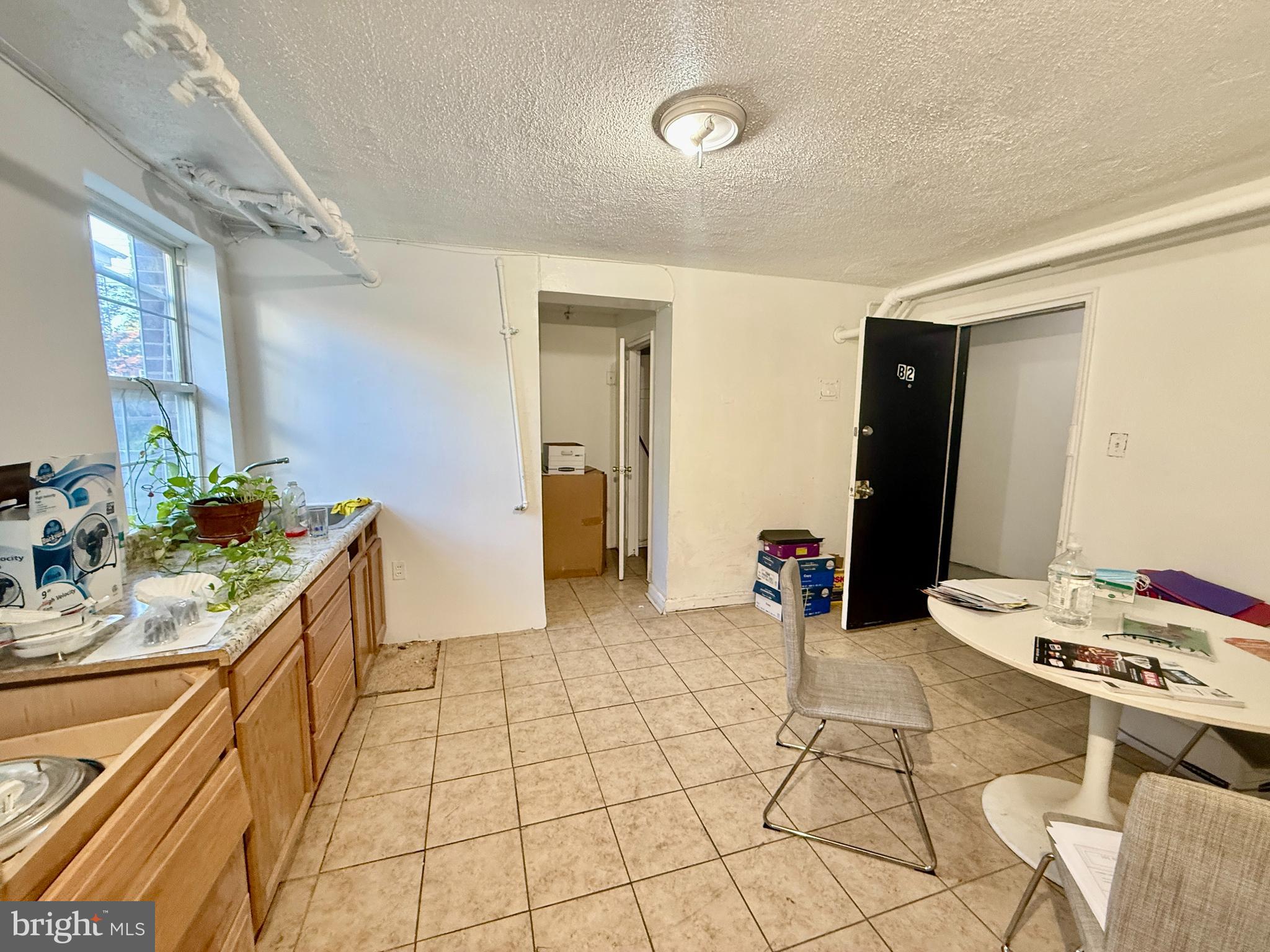 5111 Ayers Place Southeast Washington, DC 20019 - Photo 13 of 17 a large bathroom with a sink a vanity and a mirror