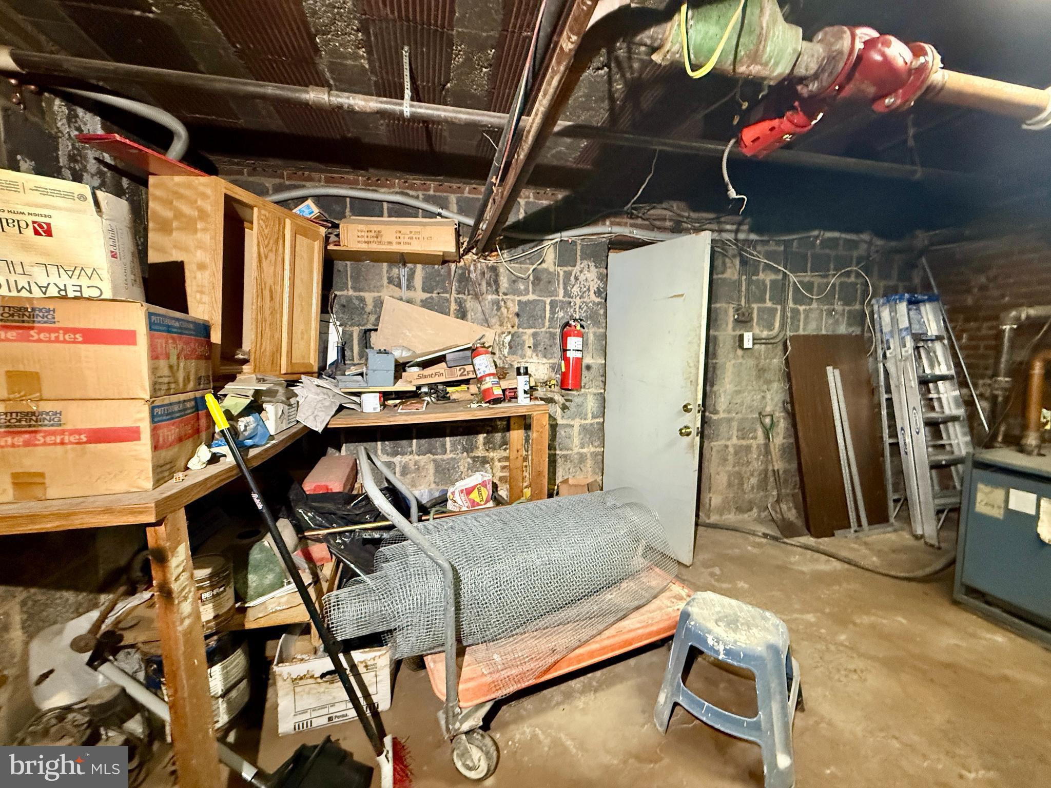 5111 Ayers Place Southeast Washington, DC 20019 - Photo 3 of 17 a storage room with furniture