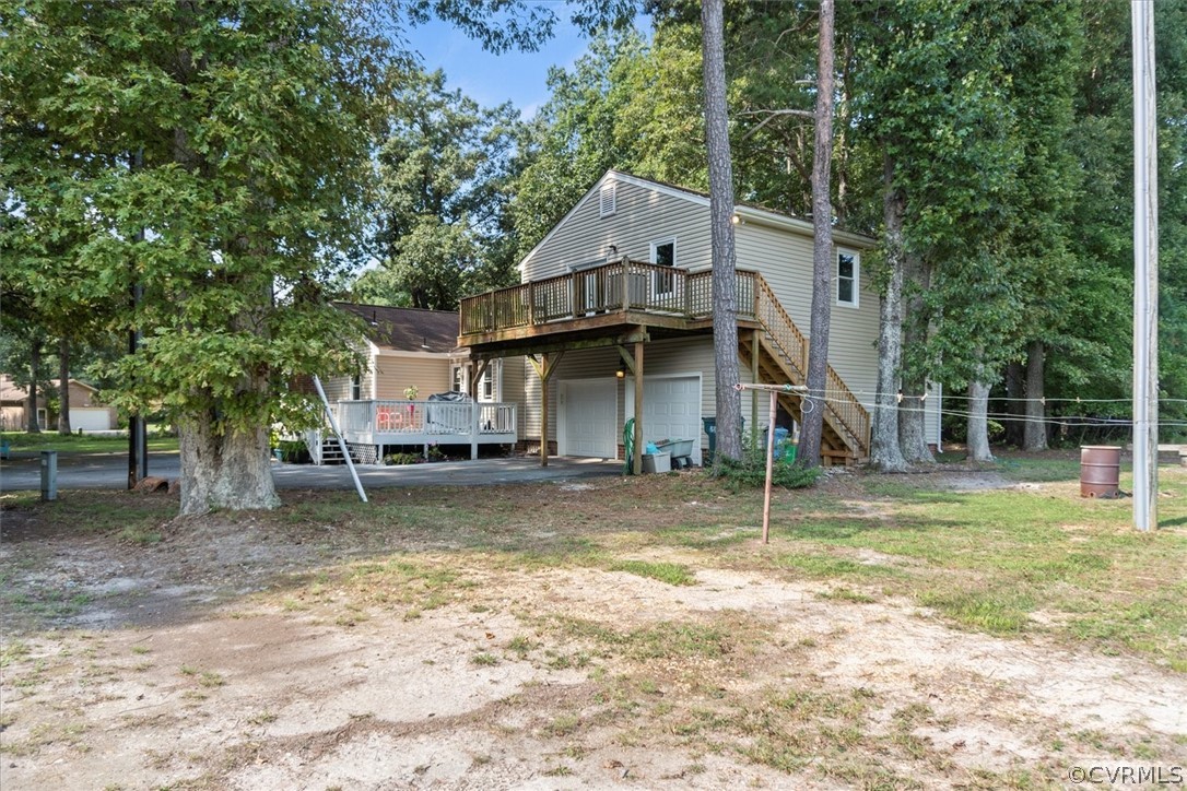 2820 Kinvan Road Richmond, VA 23231 - Photo 43 of 48 a view of a house with a yard and large tree
