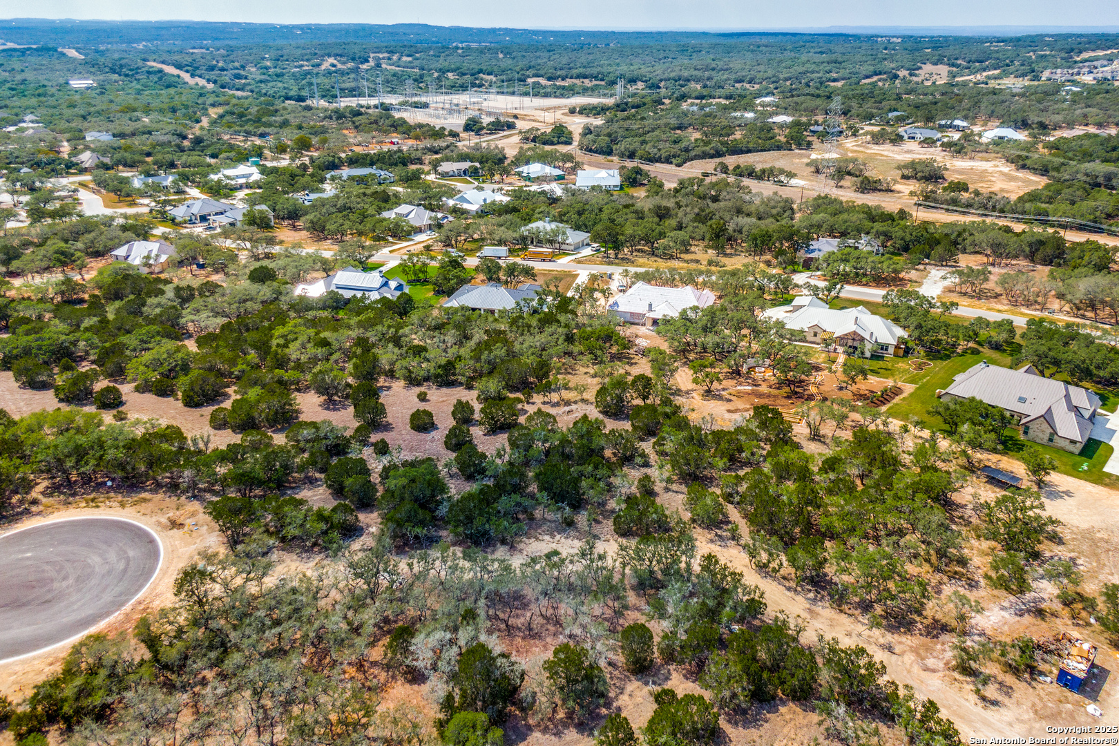 972 Scarlett Rdg Drive Bulverde, TX 78163 - Photo 6 of 10 an aerial view of residential houses with outdoor space and trees