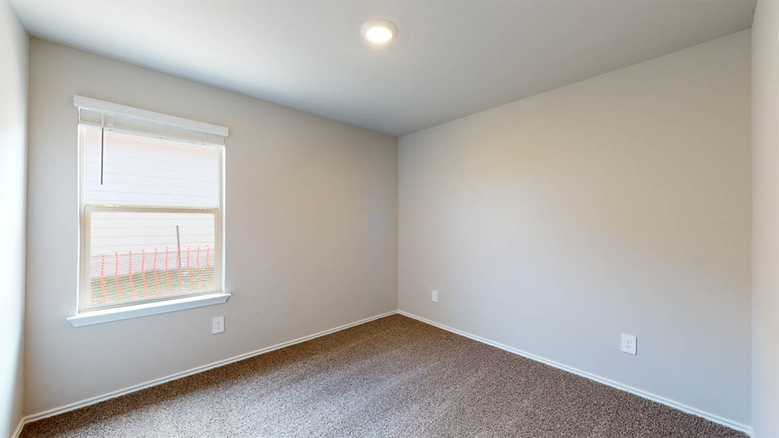 1217 Coriander Road Temple, TX 76501 - Photo 15 of 22 Neutral tone wall finishes, recessed ceiling lighting, and carpet flooring