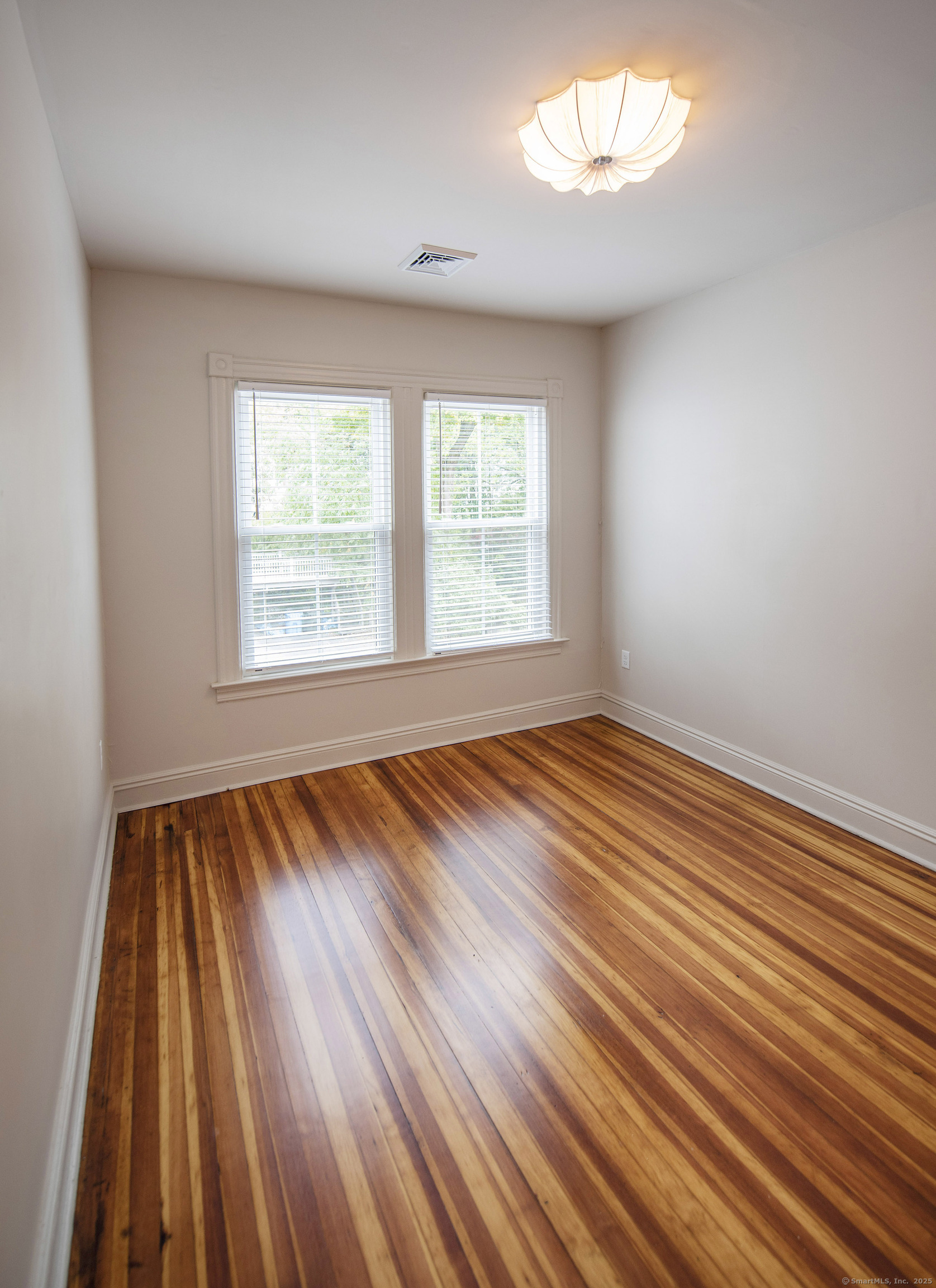87 Broad Street Norwich, CT 06360 - Photo 28 of 29 an empty room with window
