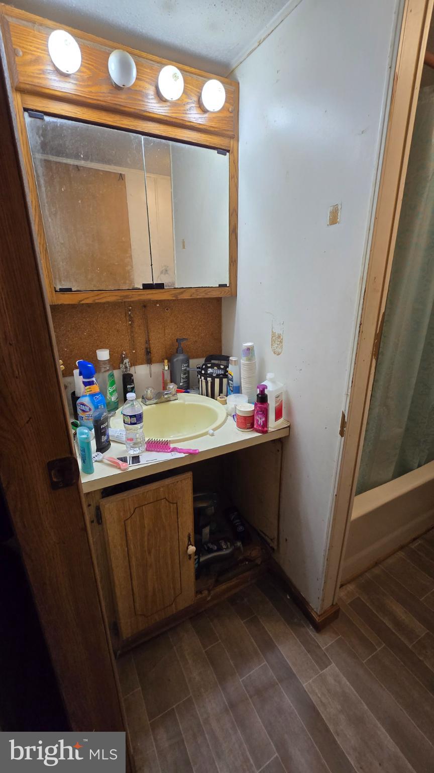 7 Hummels Lane McClure, PA 17841 - Photo 20 of 33 a bathroom with a sink and a mirror