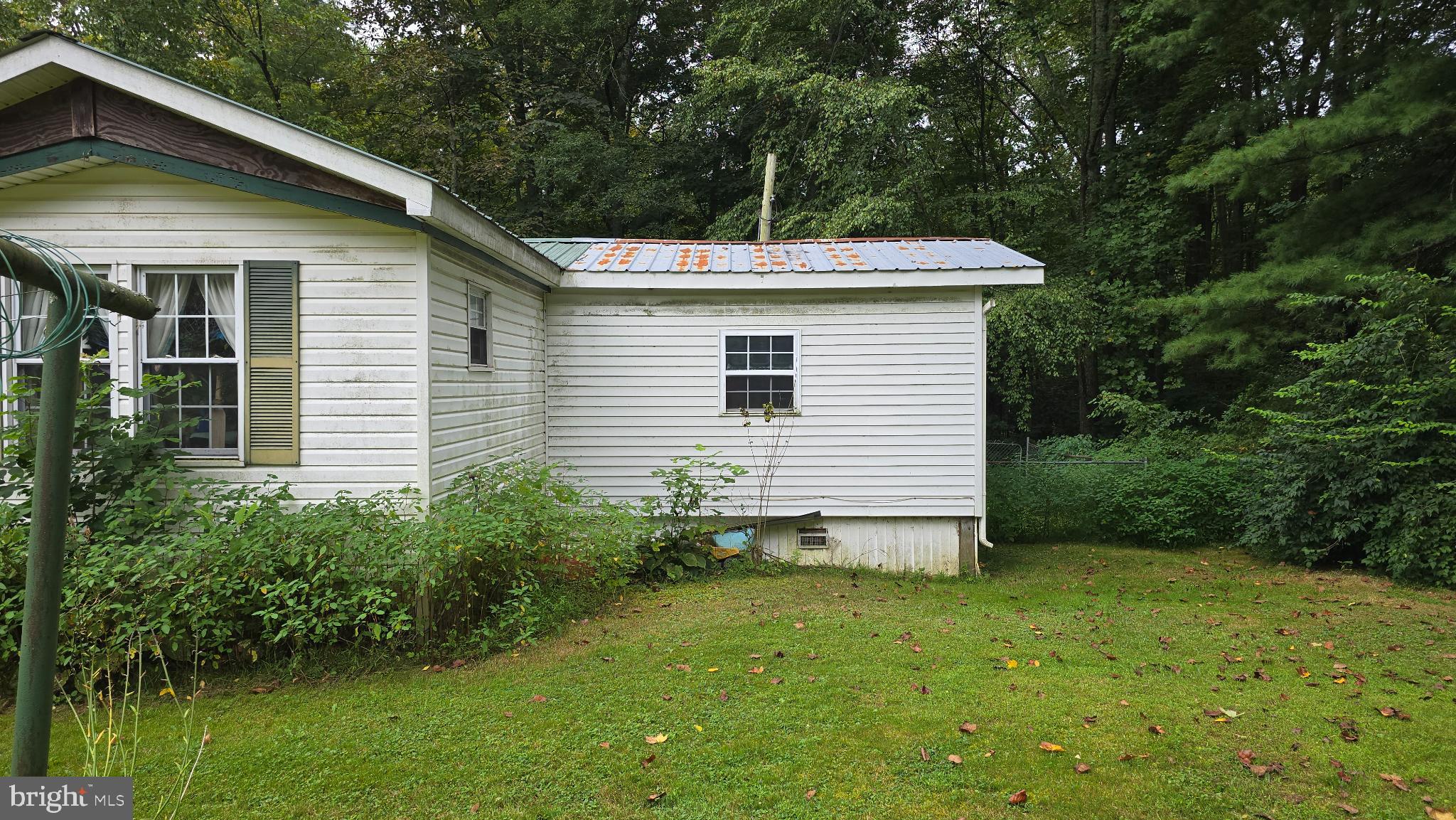 7 Hummels Lane McClure, PA 17841 - Photo 29 of 33 a front view of a house with garden