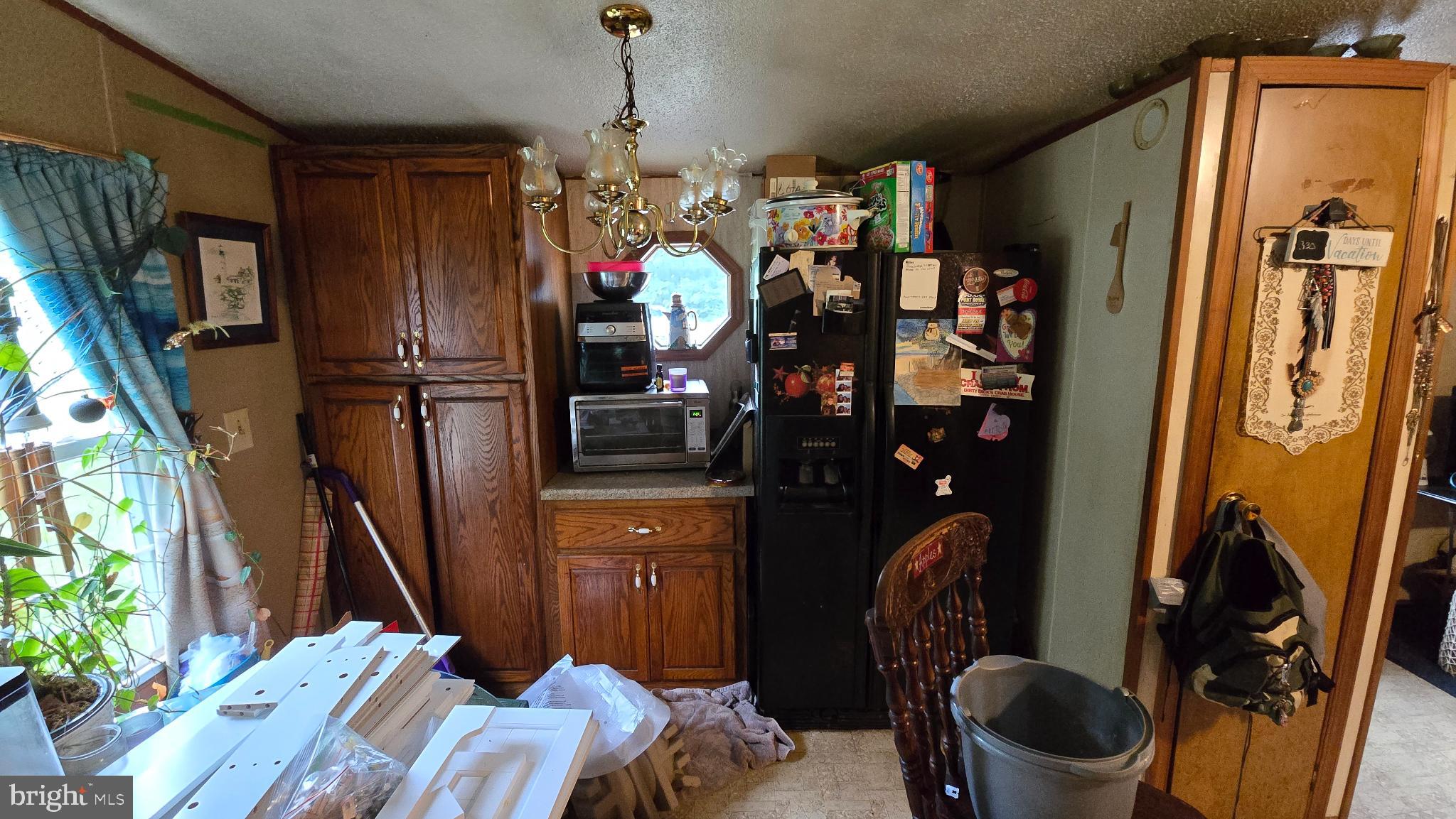 7 Hummels Lane McClure, PA 17841 - Photo 4 of 33 a bedroom with a bed closet and a potted plant