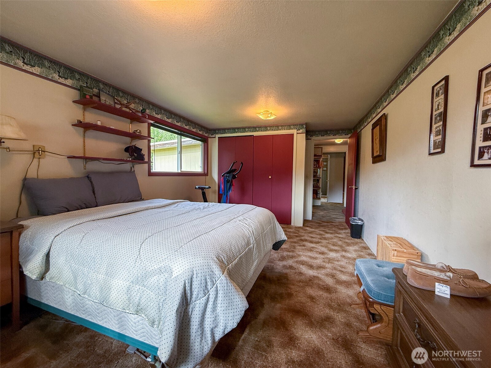 518 Bridge Street Twisp, WA 98856 - Photo 20 of 40 a spacious bedroom with a bed and a desk