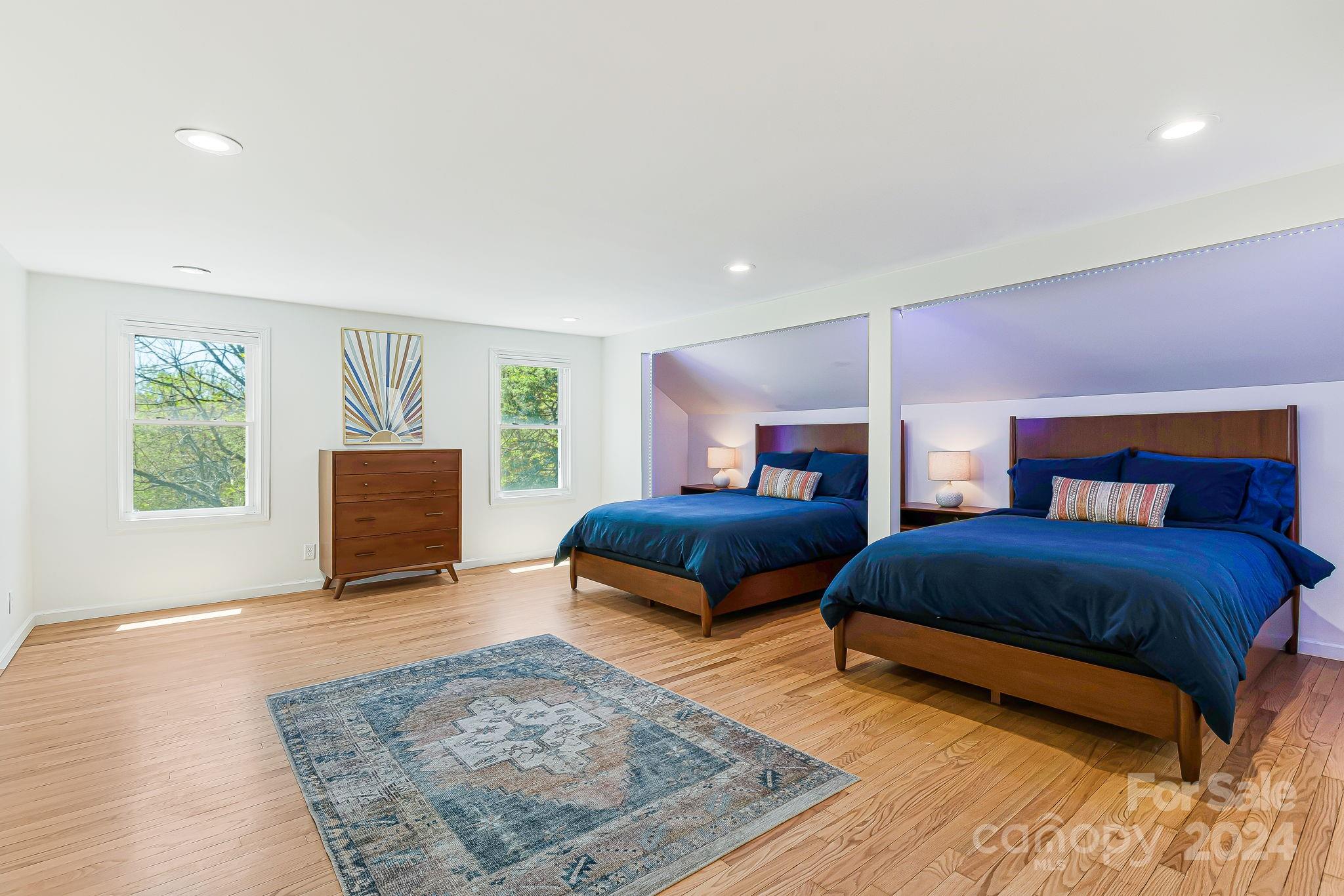 850 East Fork Road Marshall, NC 28753 - Photo 12 of 48 a bedroom with a bed and a couch