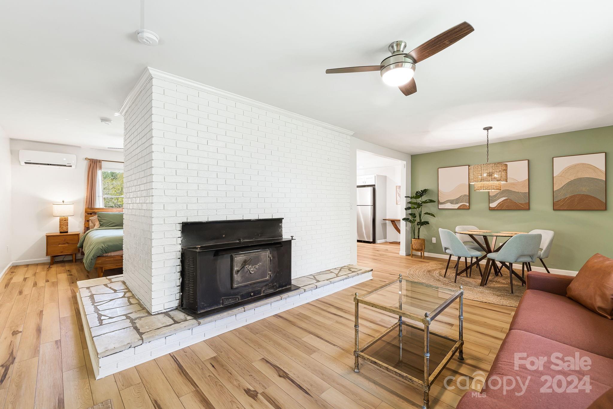 850 East Fork Road Marshall, NC 28753 - Photo 21 of 48 a living room with furniture and a fireplace