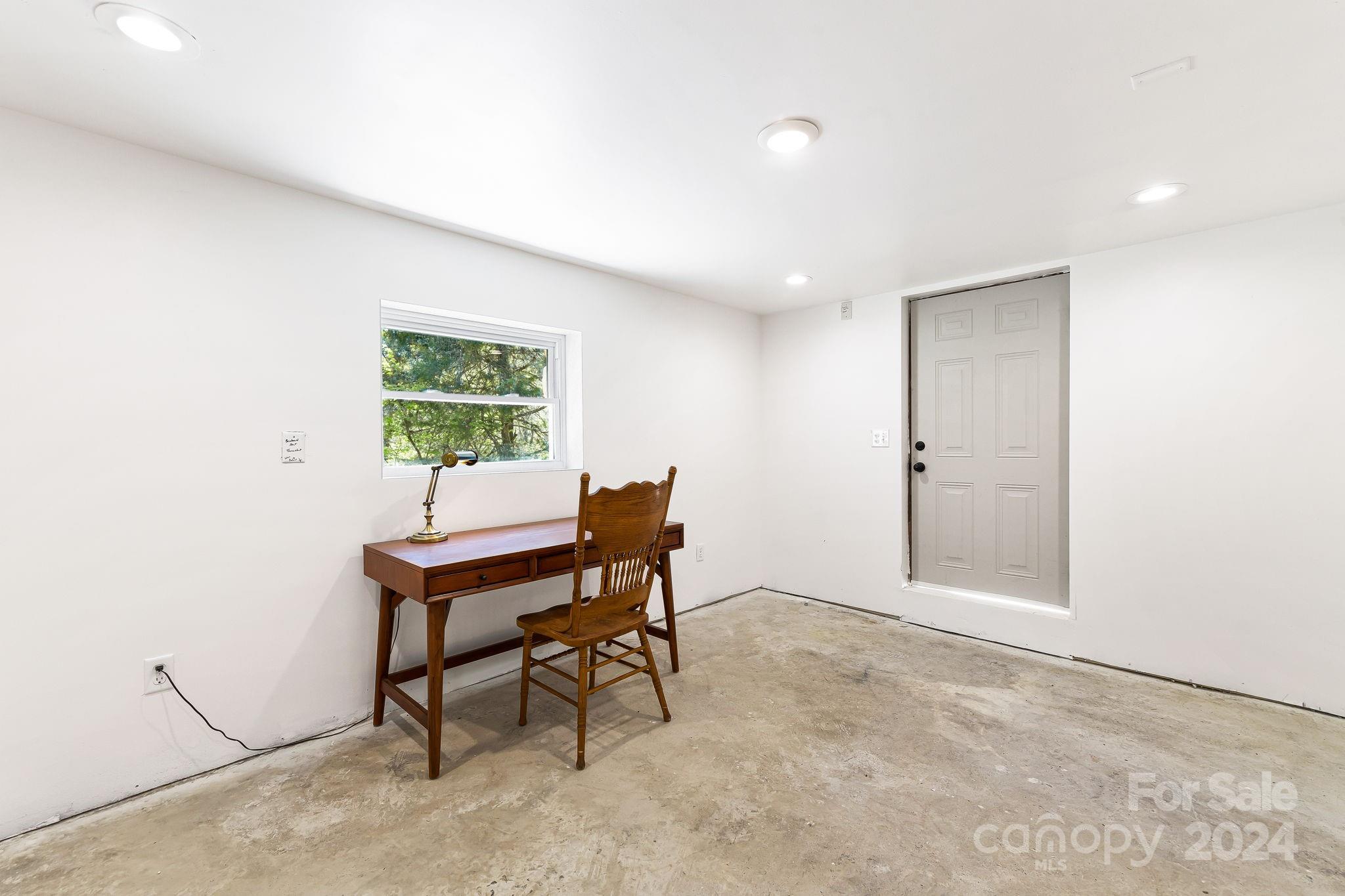 850 East Fork Road Marshall, NC 28753 - Photo 33 of 48 a workspace with furniture and a window