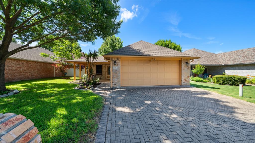 111 Sunglow Loop Red Oak, TX 75154 - Photo 2 of 25 a front view of a house with garden