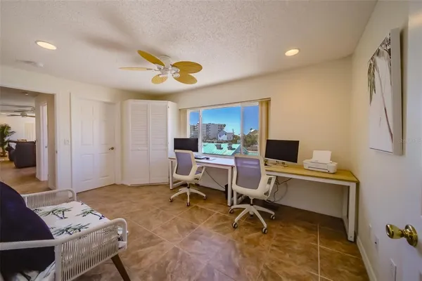 a view of a workspace with furniture