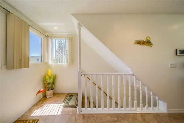 a view of entryway with a front door