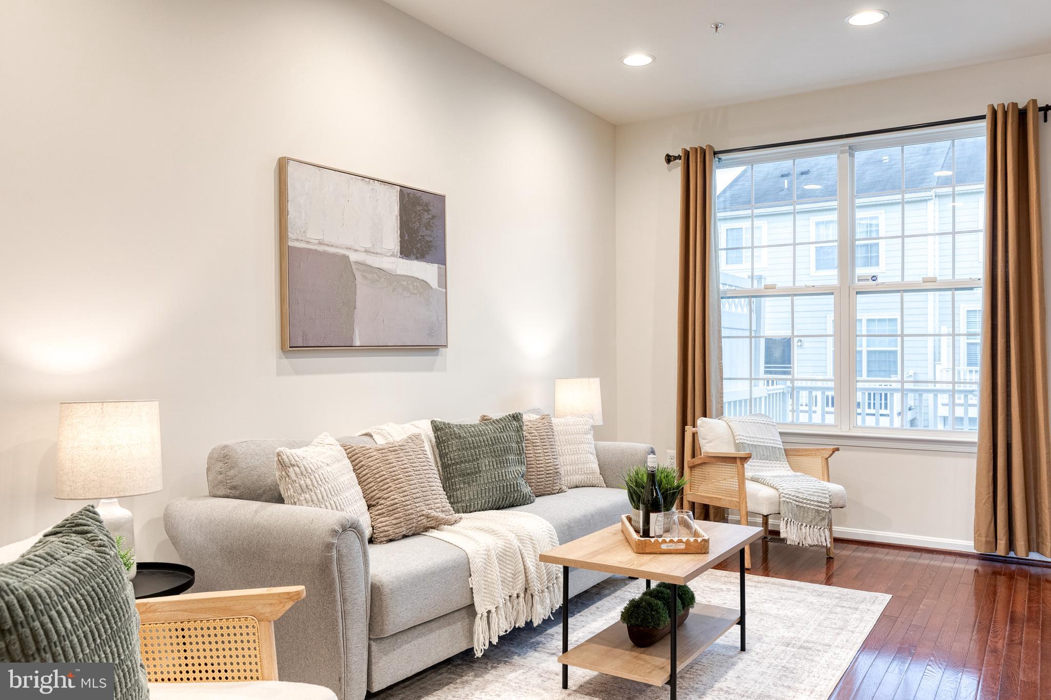 7951 Silver Oak Road Hanover, MD 21076 - Photo 11 of 41 a living room with furniture and a large window