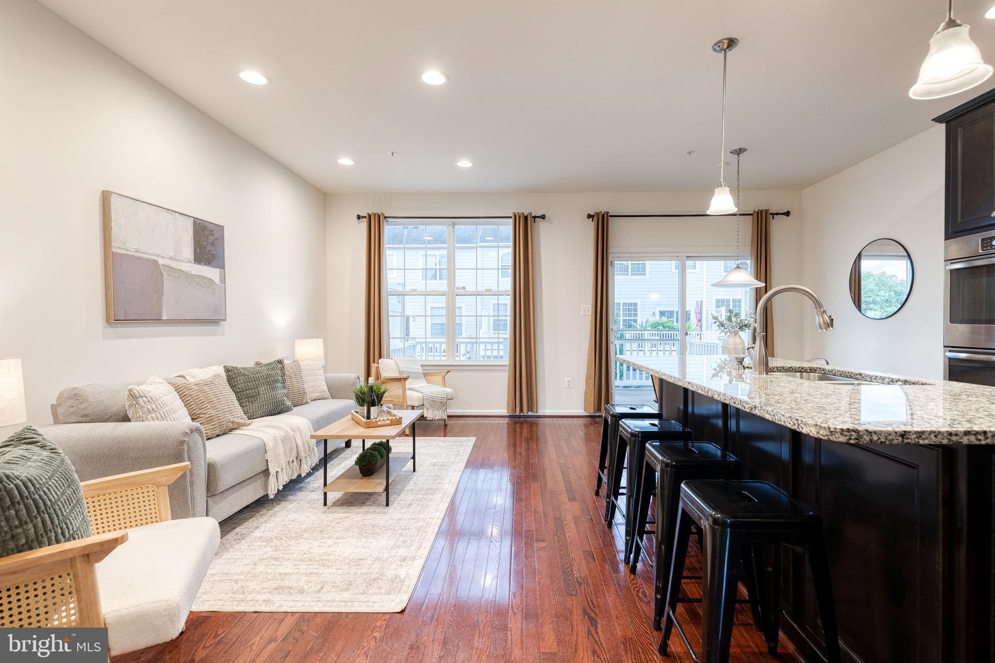 7951 Silver Oak Road Hanover, MD 21076 - Photo 12 of 41 a living room with furniture and a large window