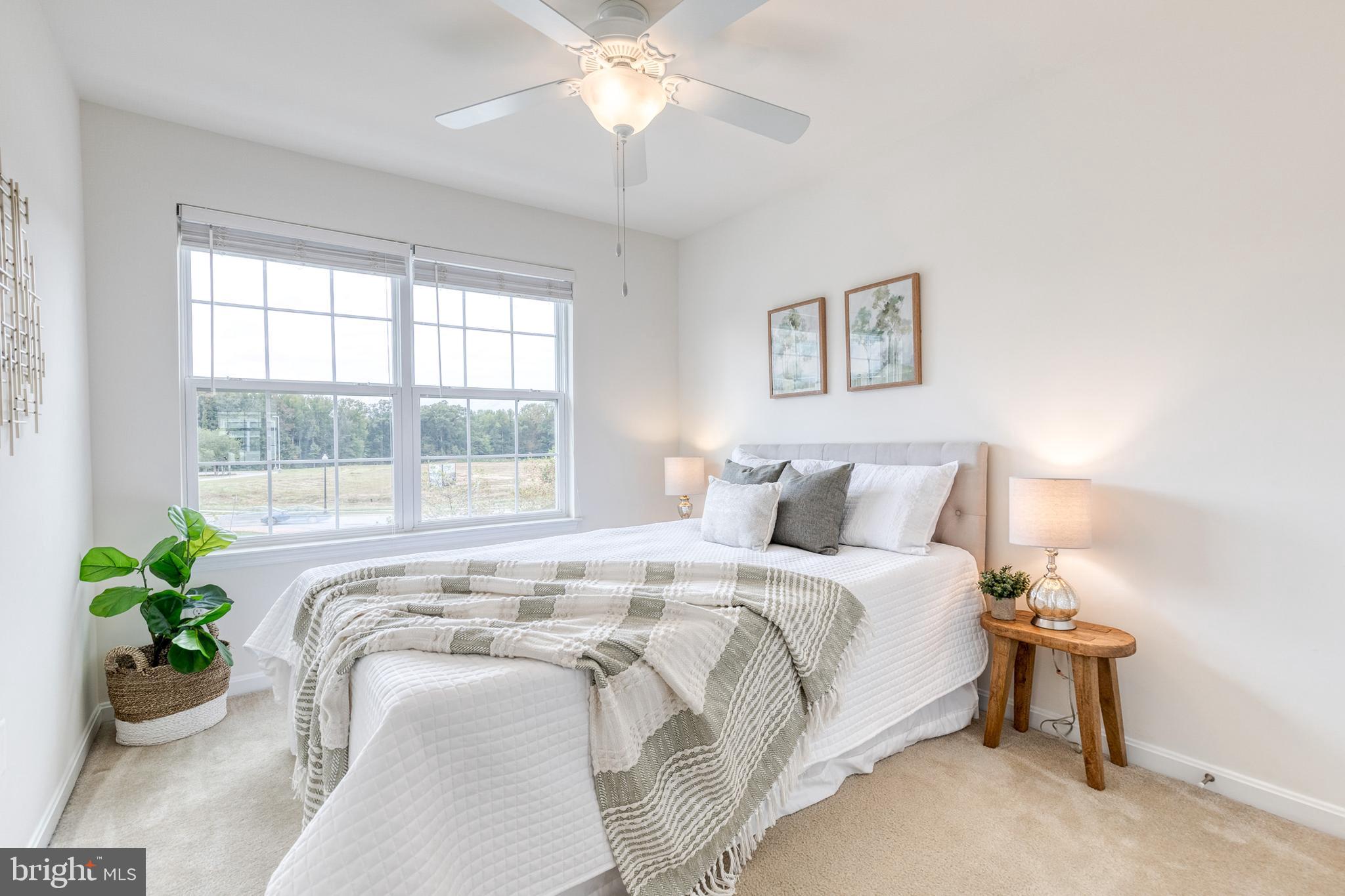 7951 Silver Oak Road Hanover, MD 21076 - Photo 29 of 41 a bedroom with bed and a window
