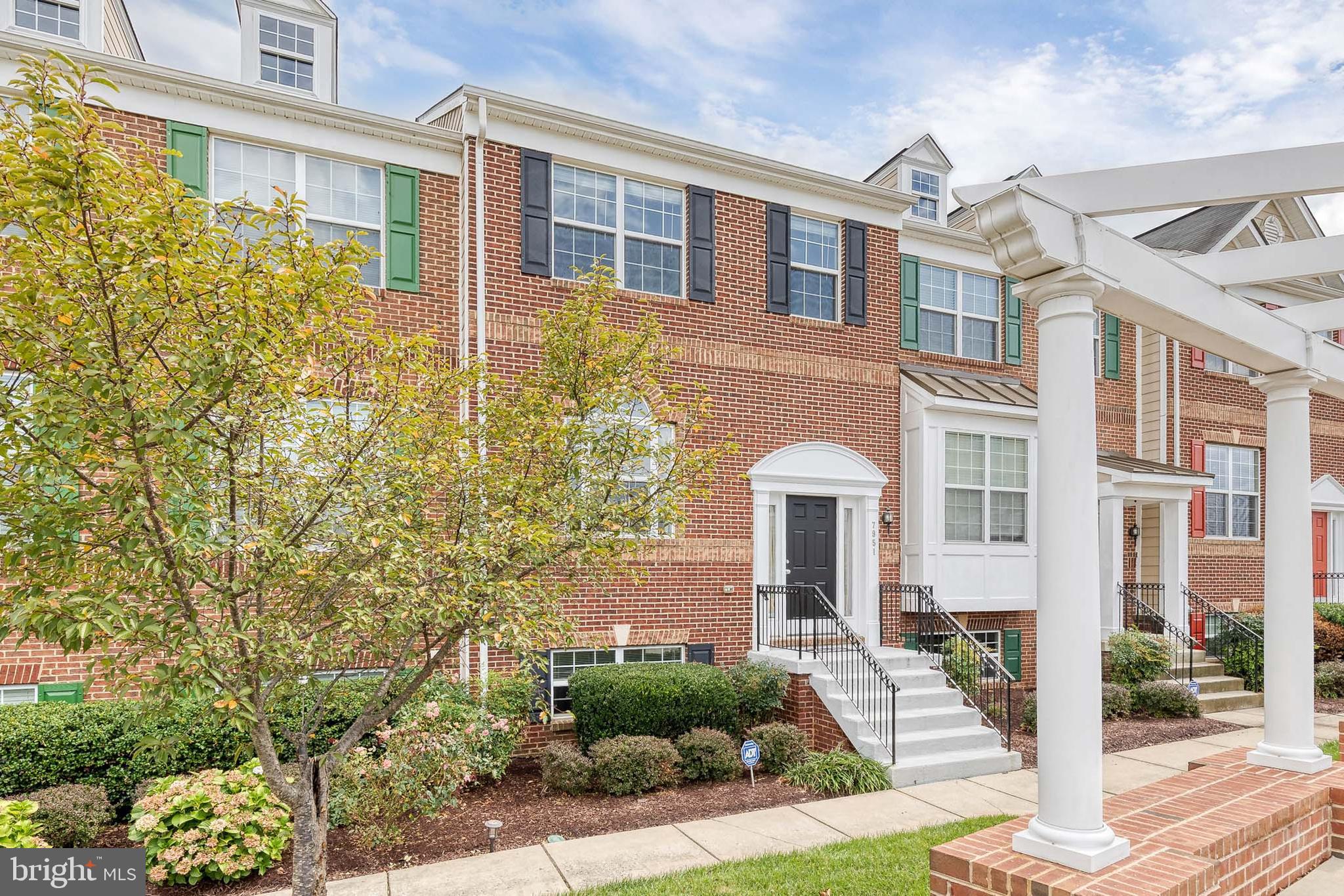 7951 Silver Oak Road Hanover, MD 21076 - Photo 3 of 41 a front view of a house with a yard