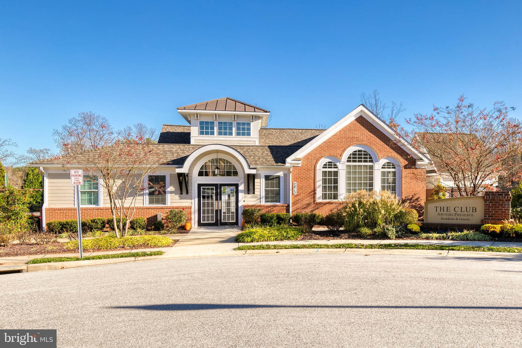 7951 Silver Oak Road Hanover, MD 21076 - Photo 37 of 41 a front view of a house with a yard