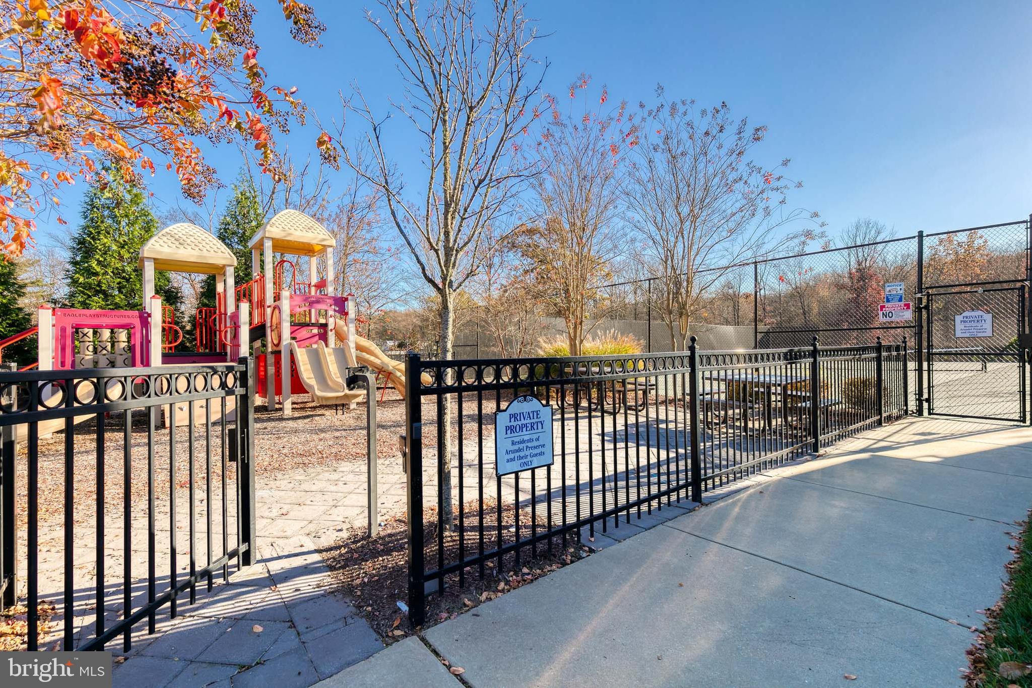 7951 Silver Oak Road Hanover, MD 21076 - Photo 40 of 41 a view of a pathway with a wrought fence