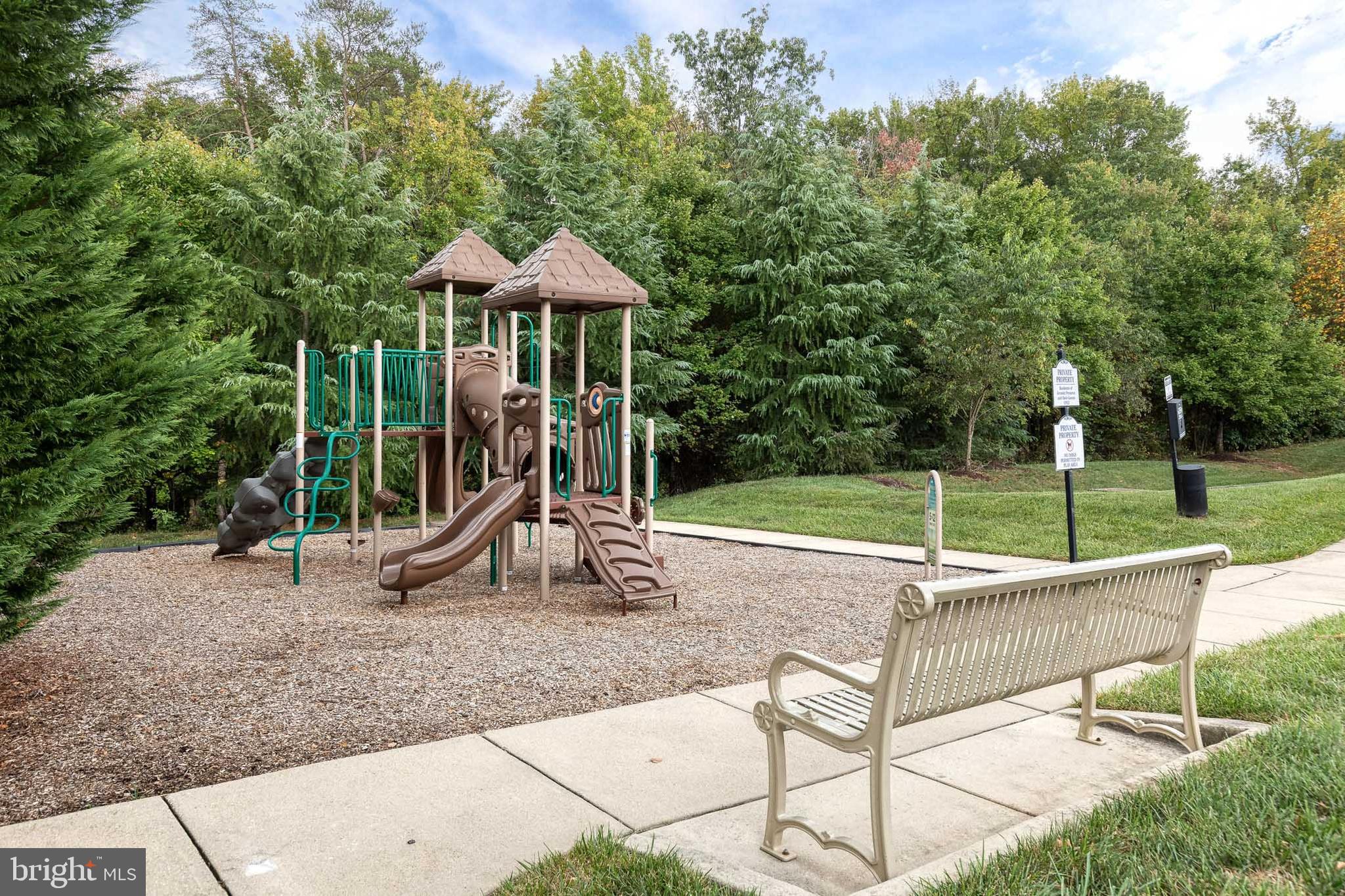7951 Silver Oak Road Hanover, MD 21076 - Photo 41 of 41 a view of a house with a backyard and a slide