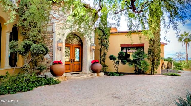 a kitchen with stainless steel appliances granite countertop lots of counter top space and wooden floor