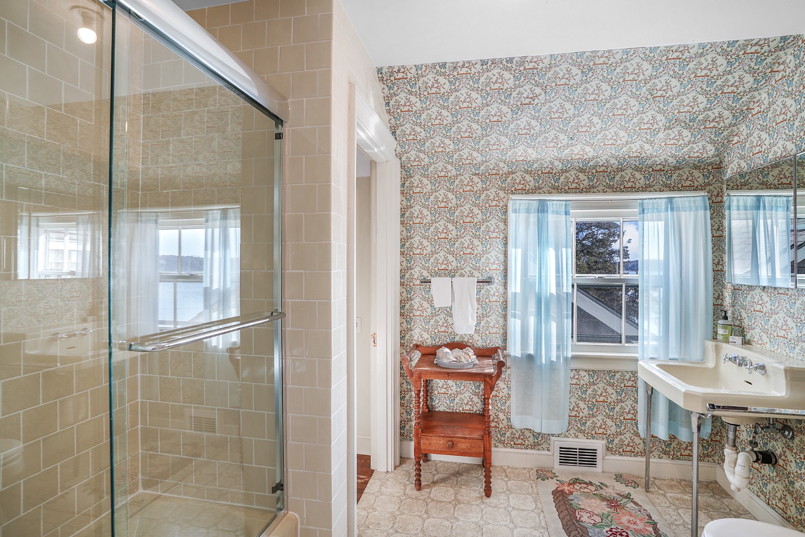 57 Hines Point Road Vineyard Haven, MA 02568 - Photo 20 of 29 a bathroom with a sink and a mirror
