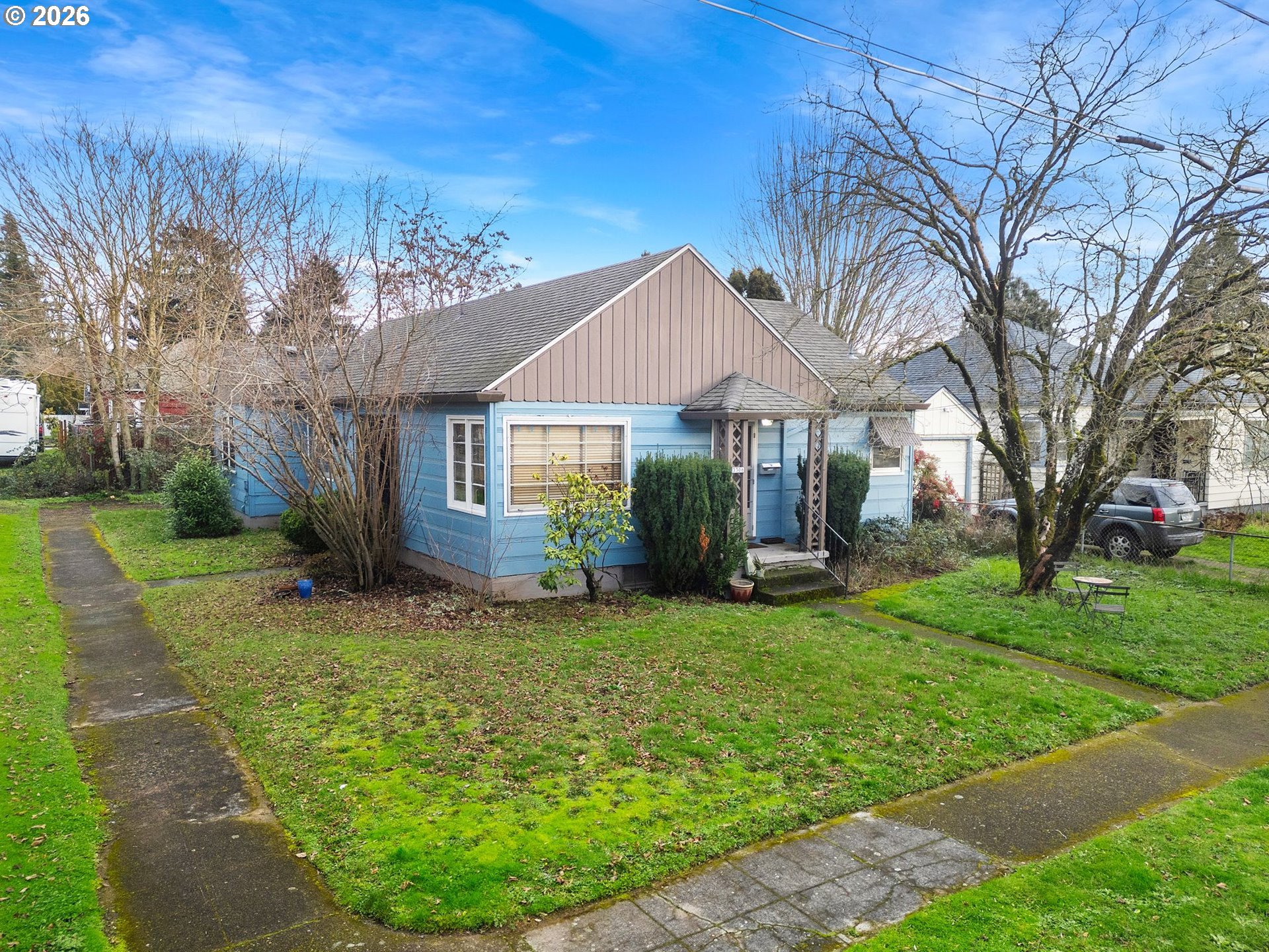 3306 Southeast 56th Avenue Portland, OR 97206 - Photo 3 of 36 a view of a house with a backyard porch and sitting area