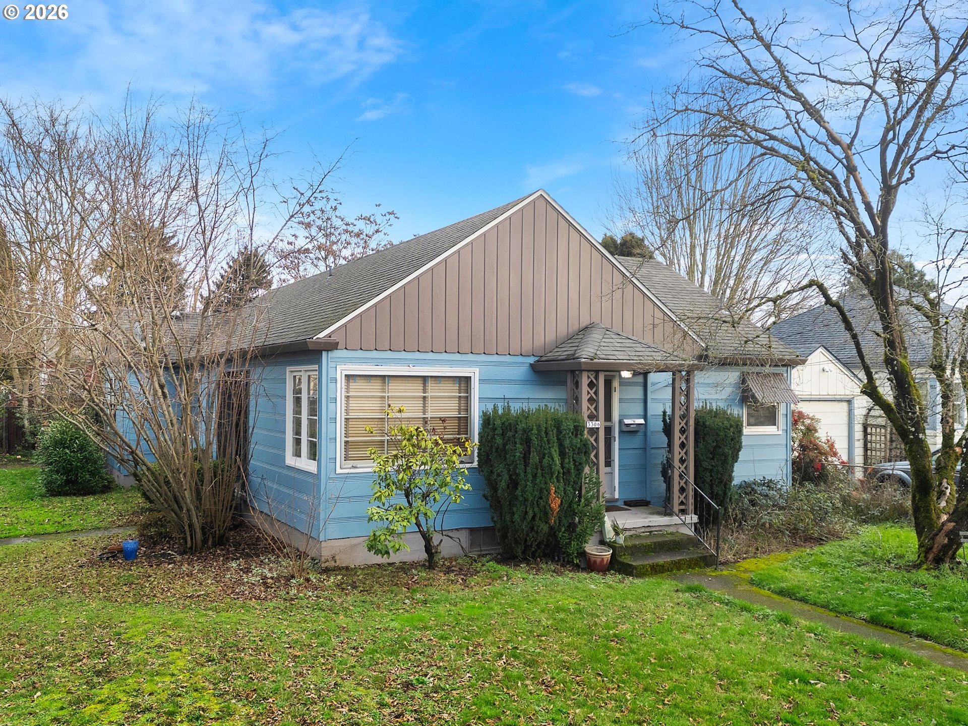 3306 Southeast 56th Avenue Portland, OR 97206 - Photo 4 of 36 a view of a house with backyard and garden