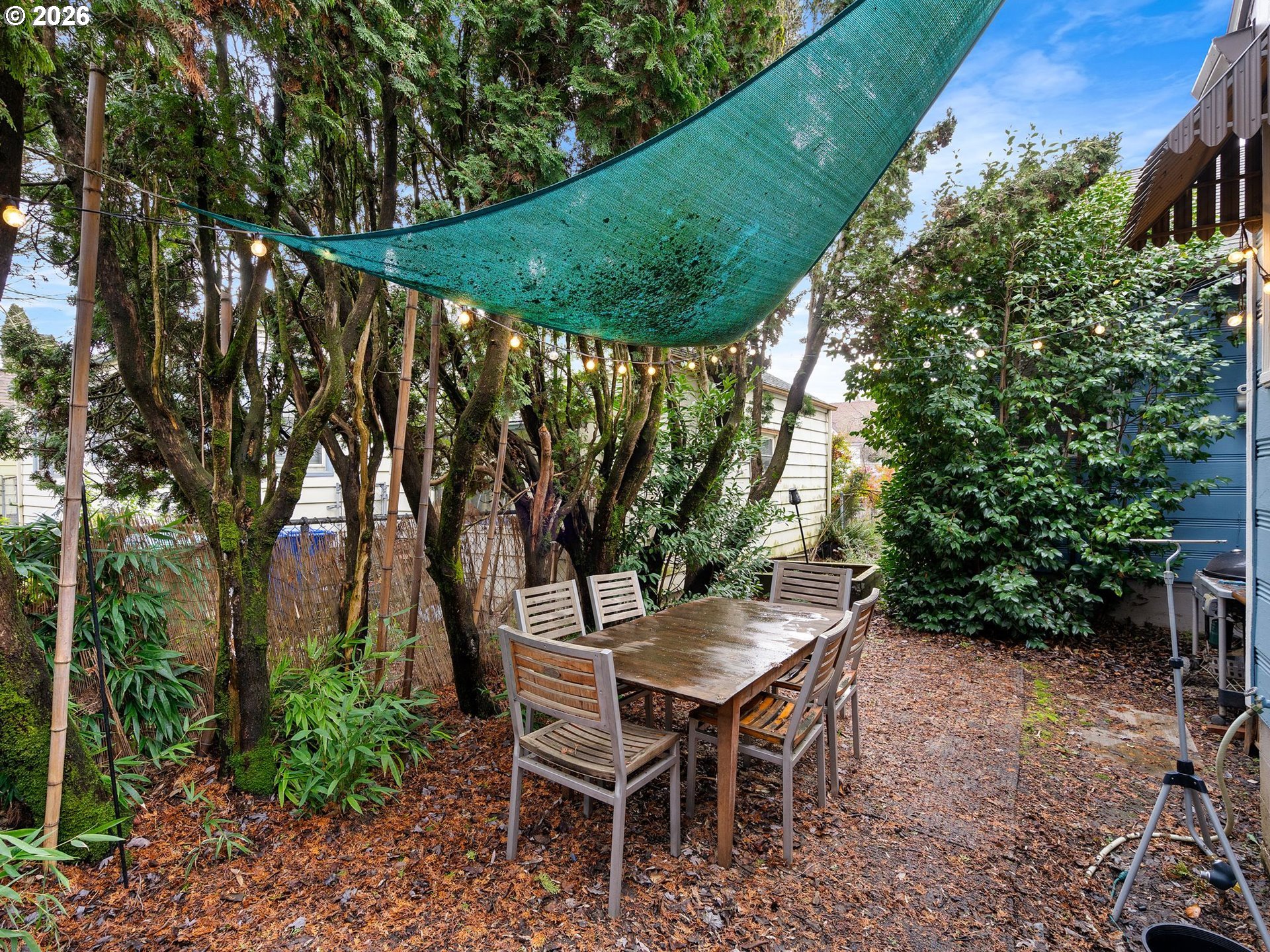 3306 Southeast 56th Avenue Portland, OR 97206 - Photo 9 of 36 a backyard of a house with outdoor seating