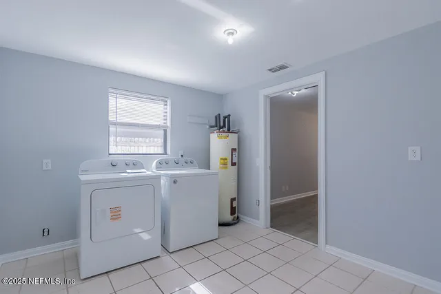 a view of a kitchen with cabinets