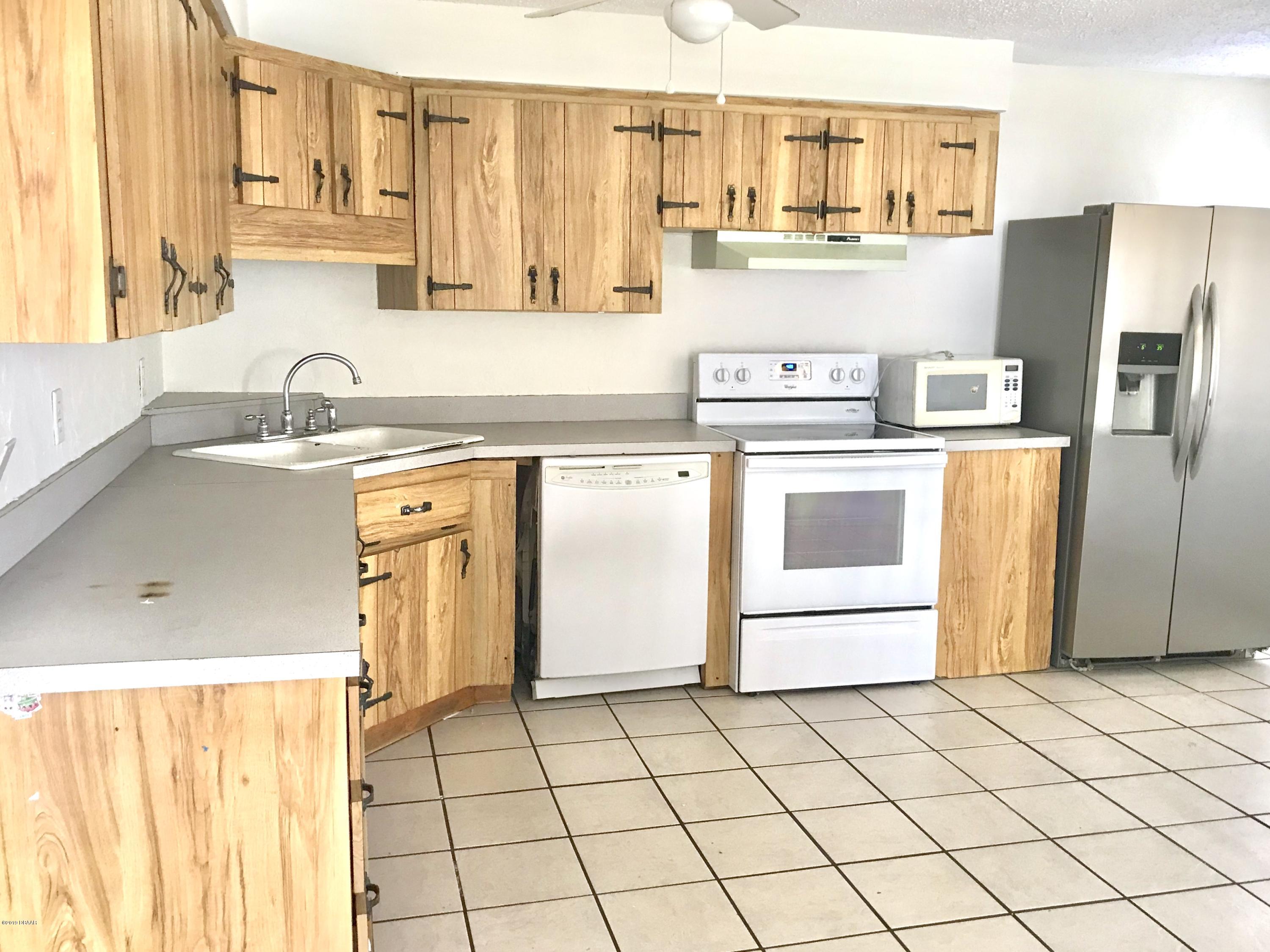 282 Farmbrook Road Port Orange, FL 32127 - Photo 4 of 9 EE602A18-71AF-4BAB-88C5-B01A834DC8AB